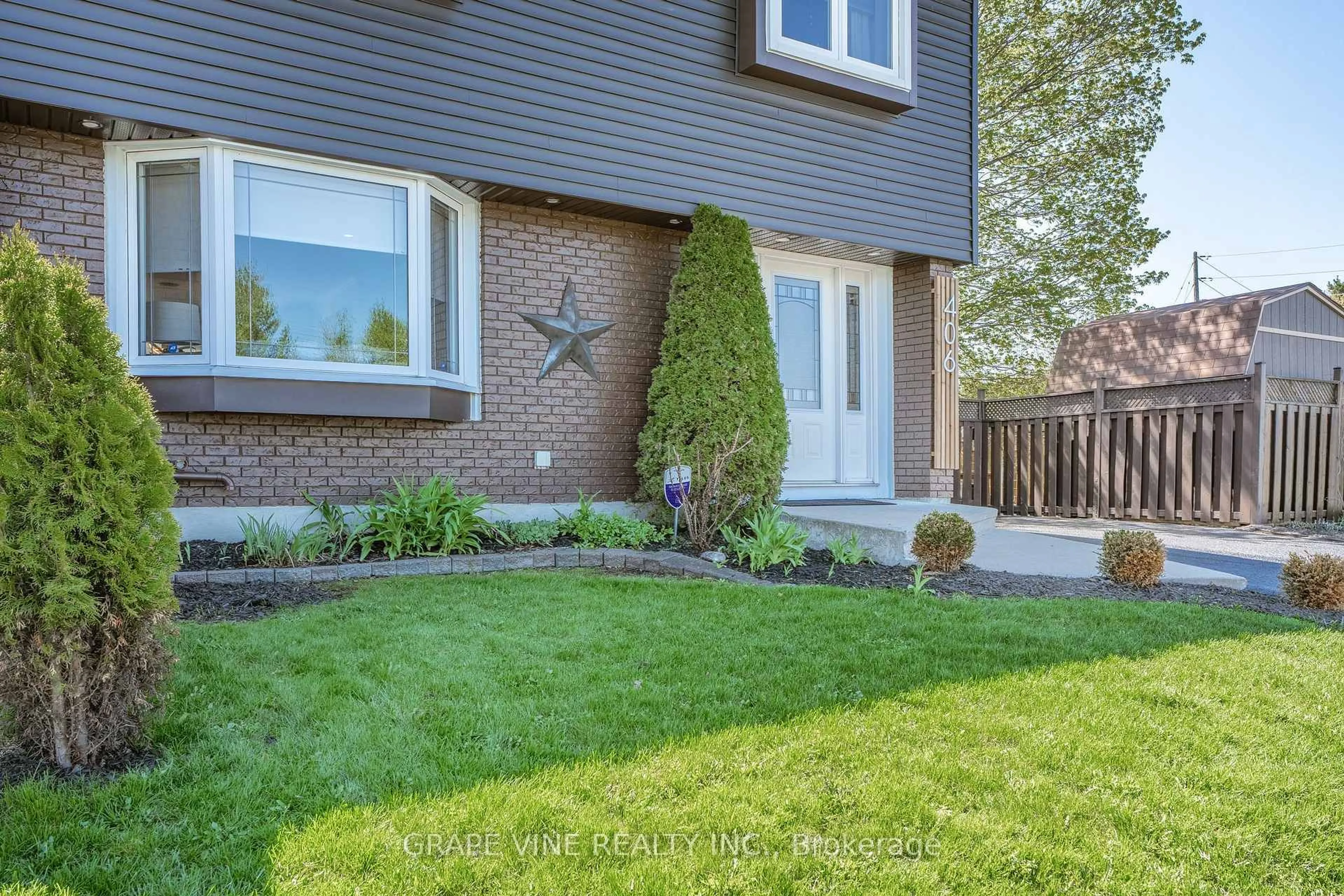 Home with brick exterior material, street for 406 Woodfield Dr, Ottawa Ontario K2G 3W9