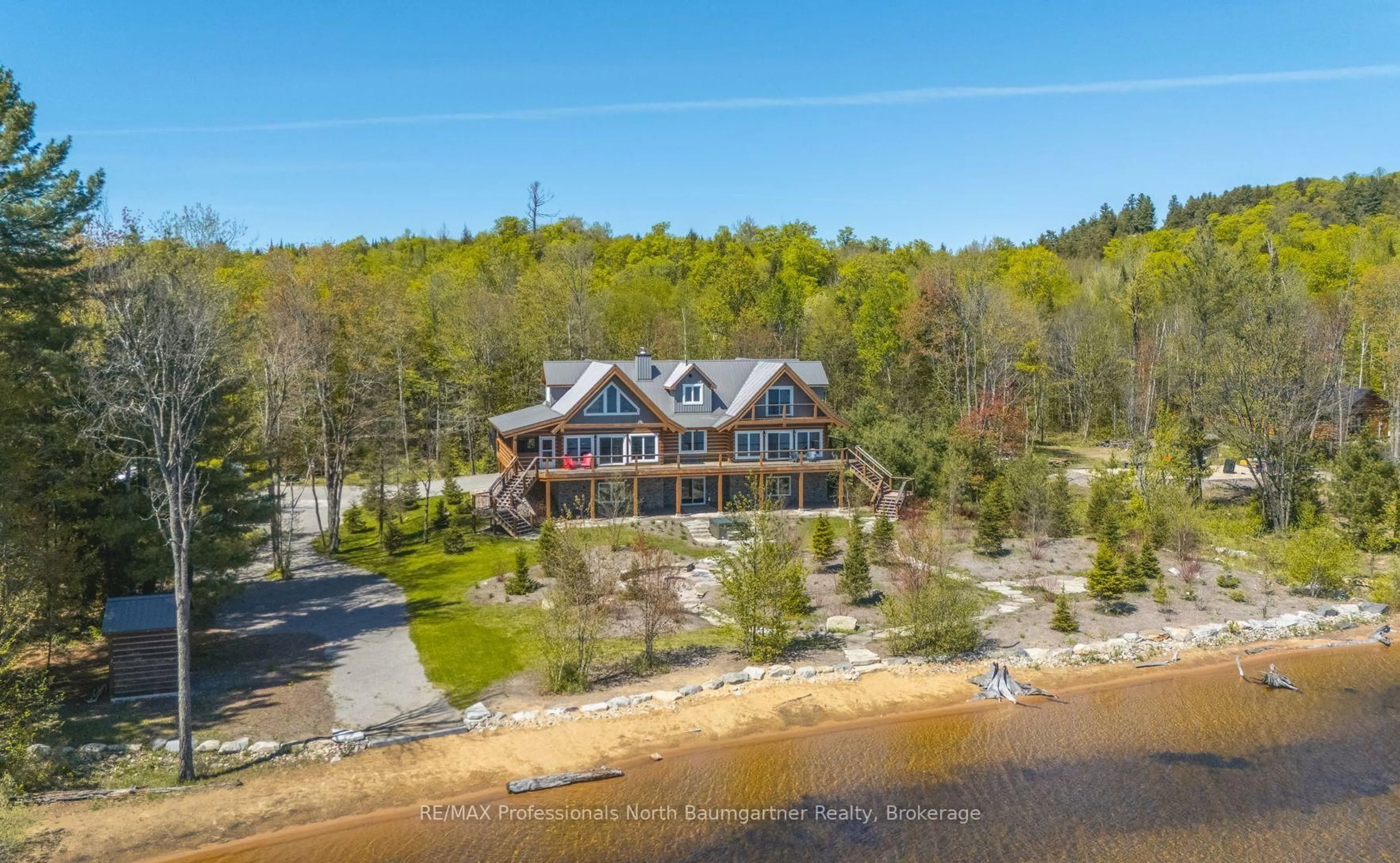 A pic from outside/outdoor area/front of a property/back of a property/a pic from drone, water/lake/river/ocean view for 2987 Boice Bradley Rd, Dysart et al Ontario K0M 1S0