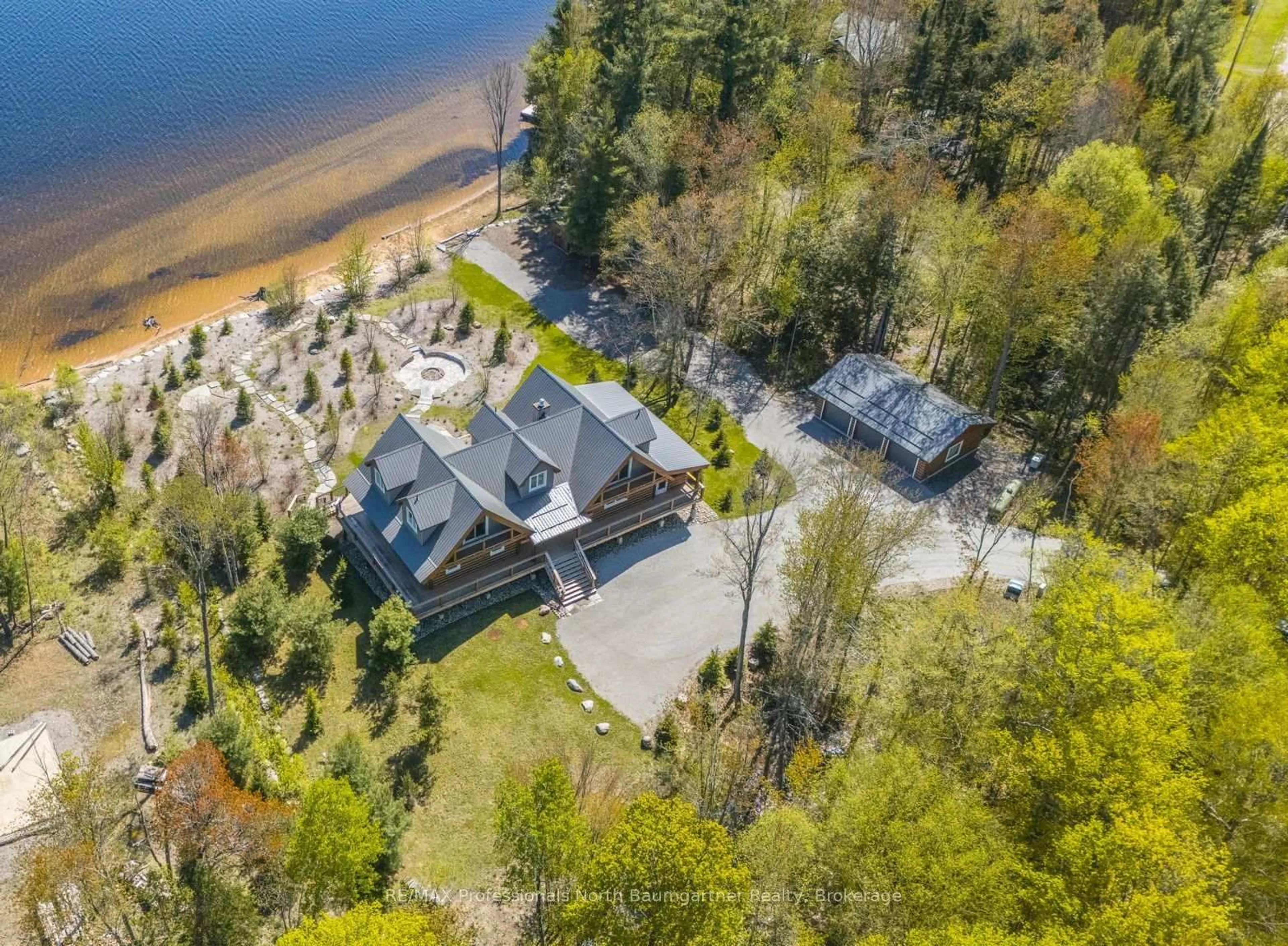 A pic from outside/outdoor area/front of a property/back of a property/a pic from drone, water/lake/river/ocean view for 2987 Boice Bradley Rd, Dysart et al Ontario K0M 1S0