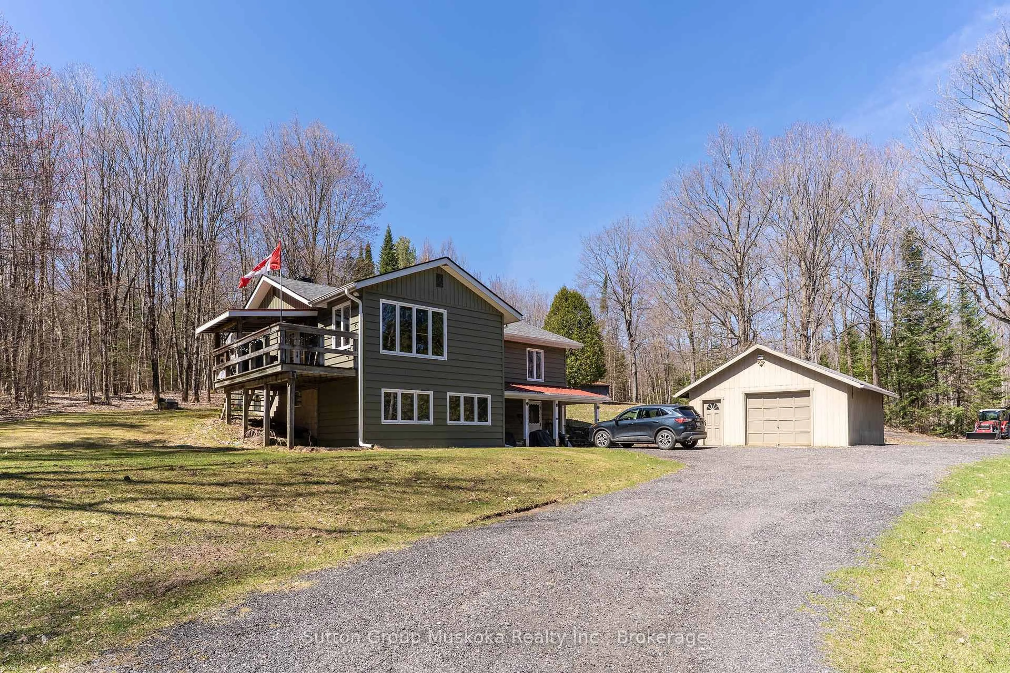 A pic from outside/outdoor area/front of a property/back of a property/a pic from drone, unknown for 124 Old School House Rd, Huntsville Ontario P1H 2J4