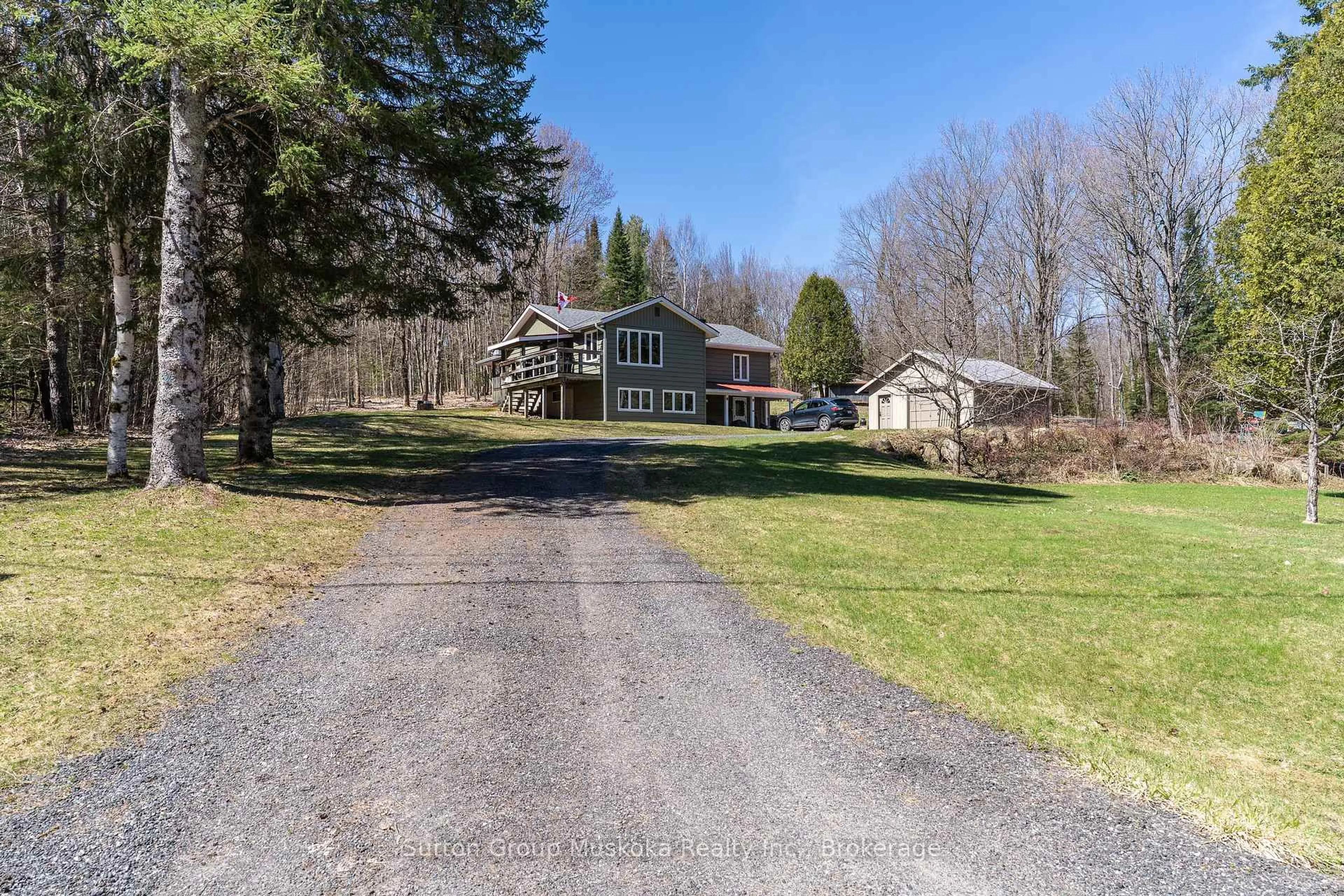 A pic from outside/outdoor area/front of a property/back of a property/a pic from drone, unknown for 124 Old School House Rd, Huntsville Ontario P1H 2J4