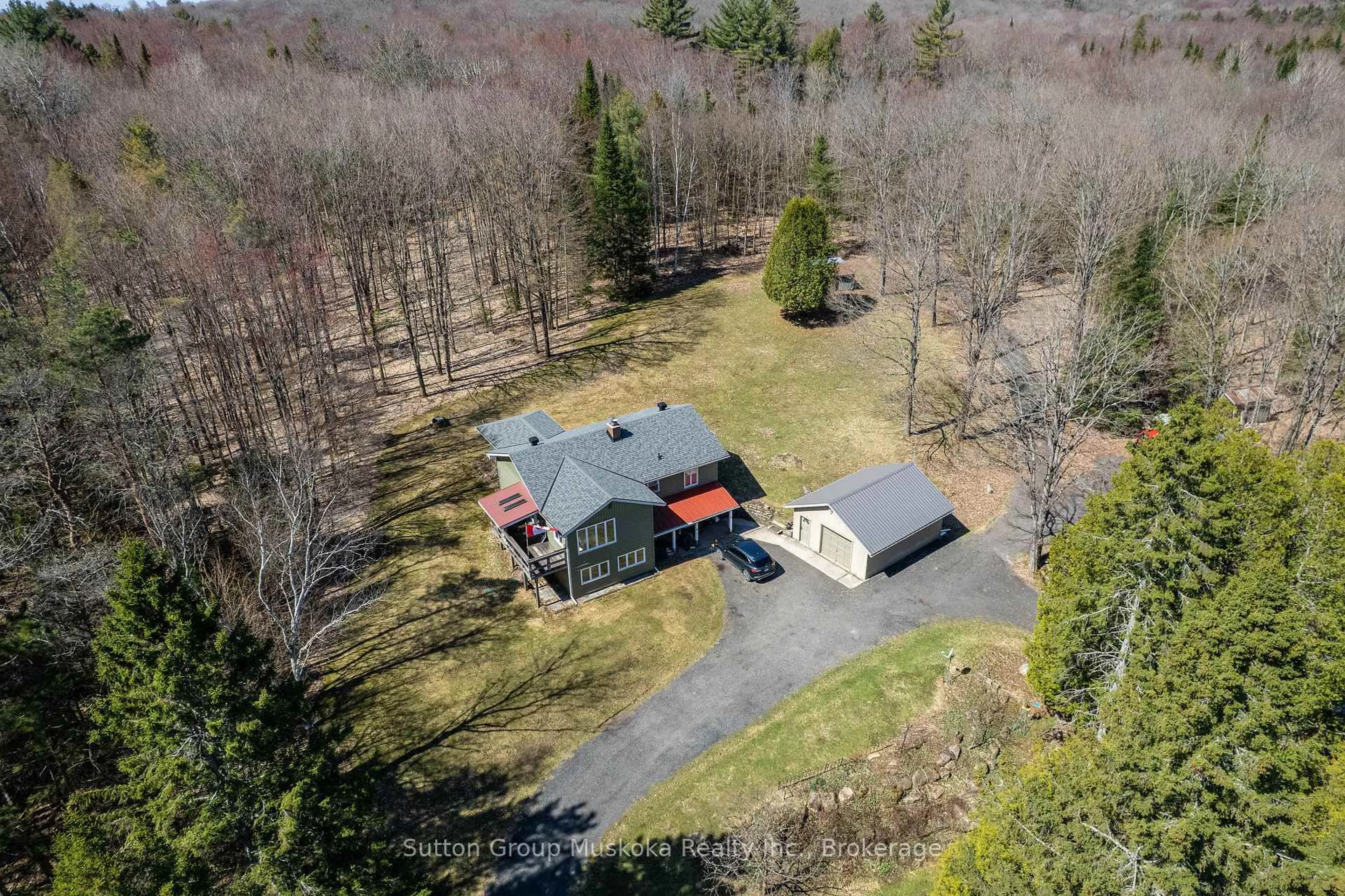 A pic from outside/outdoor area/front of a property/back of a property/a pic from drone, unknown for 124 Old School House Rd, Huntsville Ontario P1H 2J4