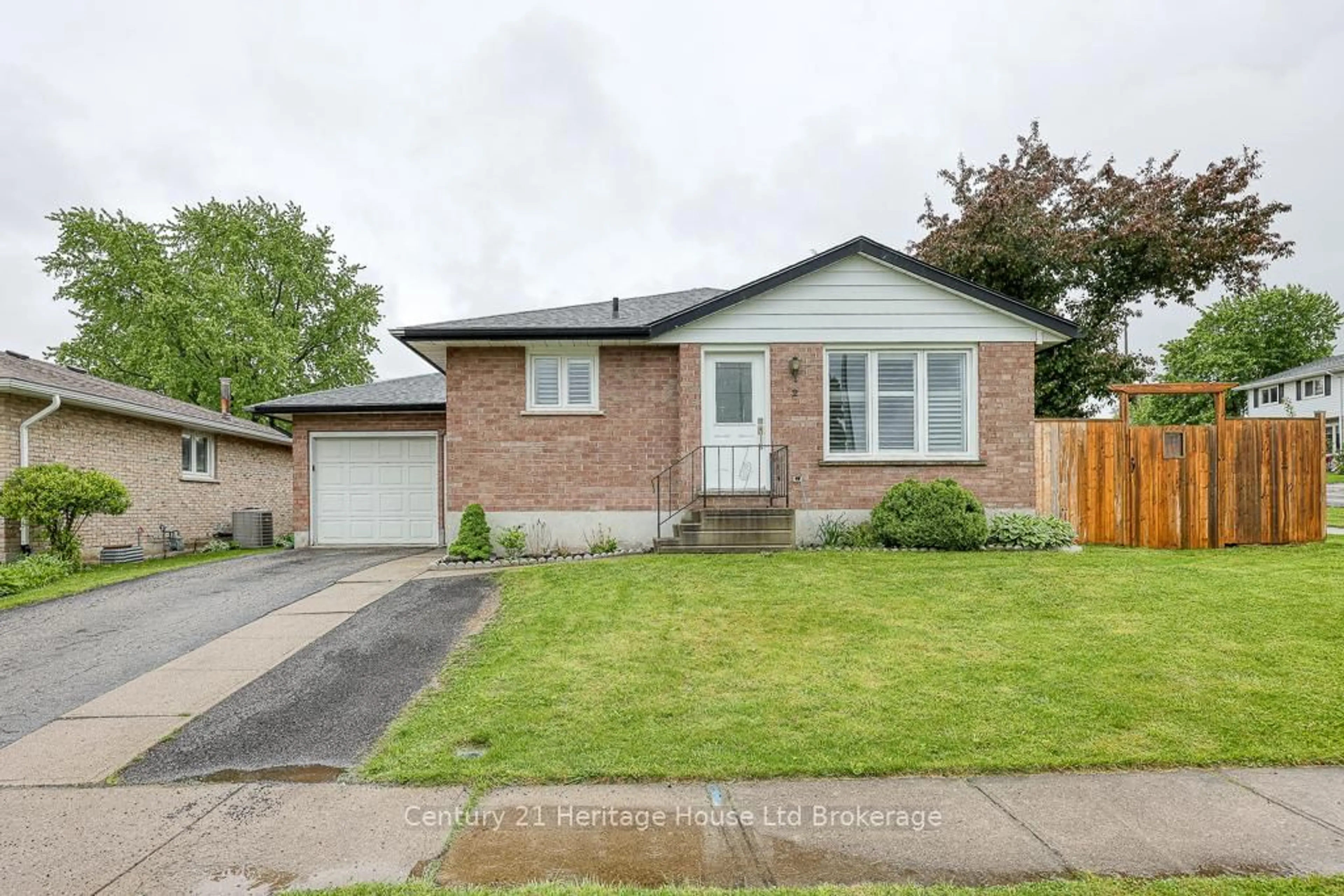 Home with brick exterior material, street for 2 Chippewa Ave, Woodstock Ontario N4T 1A1