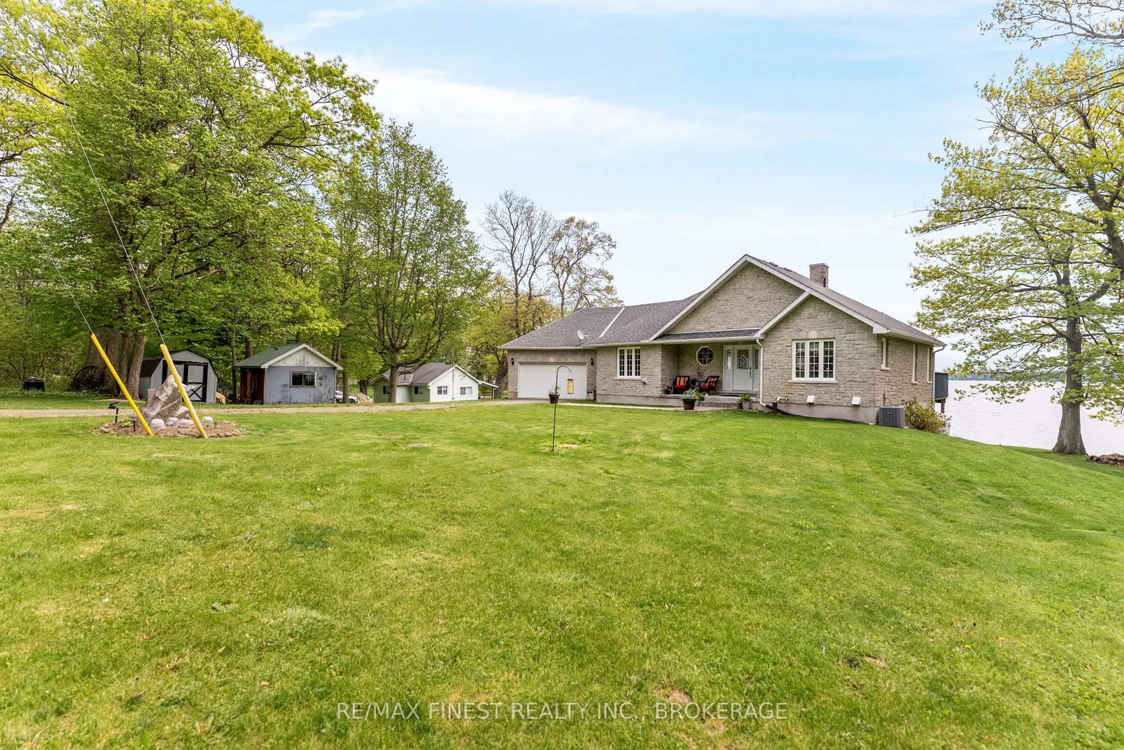 A pic from outside/outdoor area/front of a property/back of a property/a pic from drone, unknown for 121 Hickory Lane, Wolfe Island Ontario K0H 2Y0