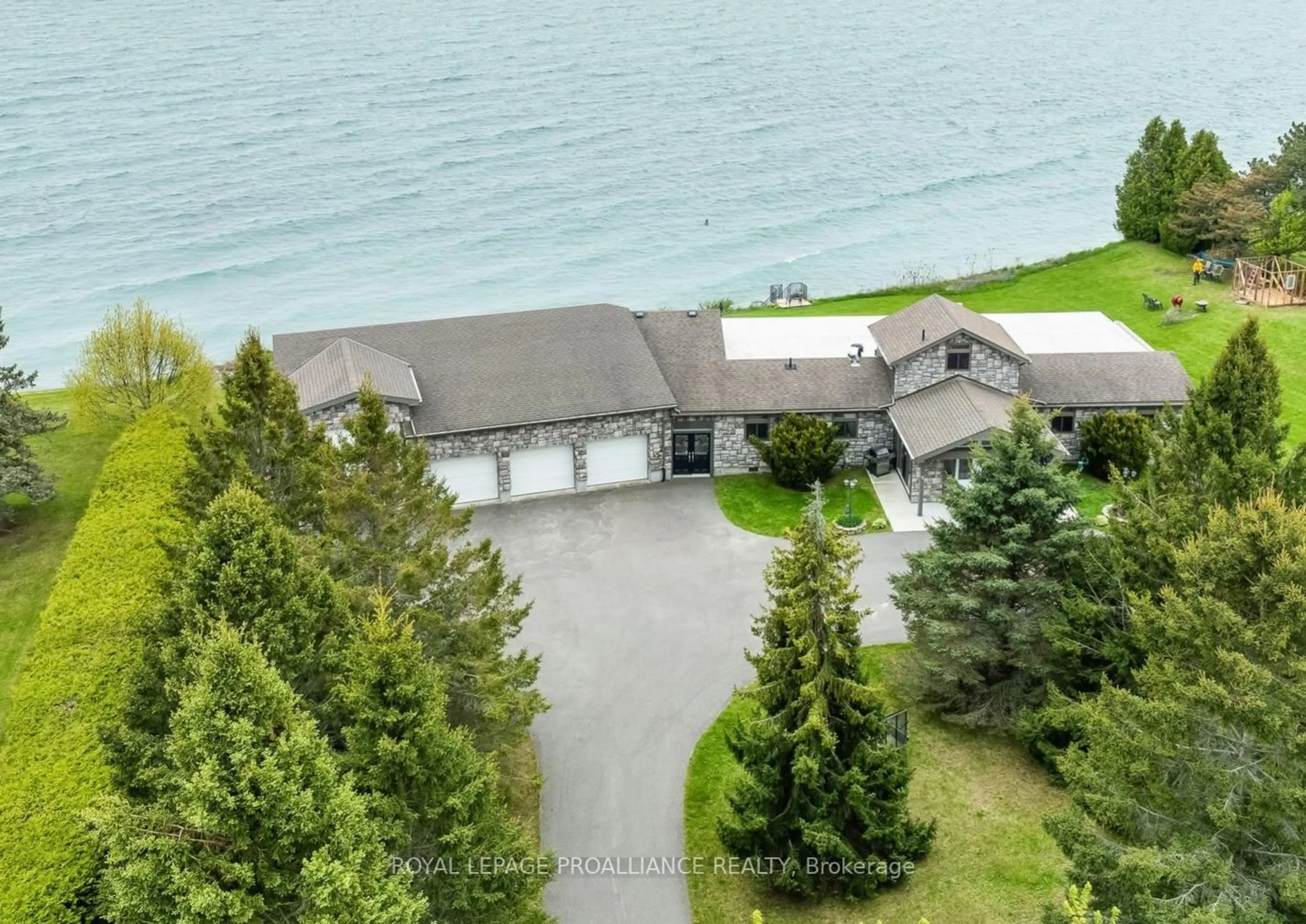 A pic from outside/outdoor area/front of a property/back of a property/a pic from drone, water/lake/river/ocean view for 431 Victoria Beach Rd, Cramahe Ontario K0K 1S0