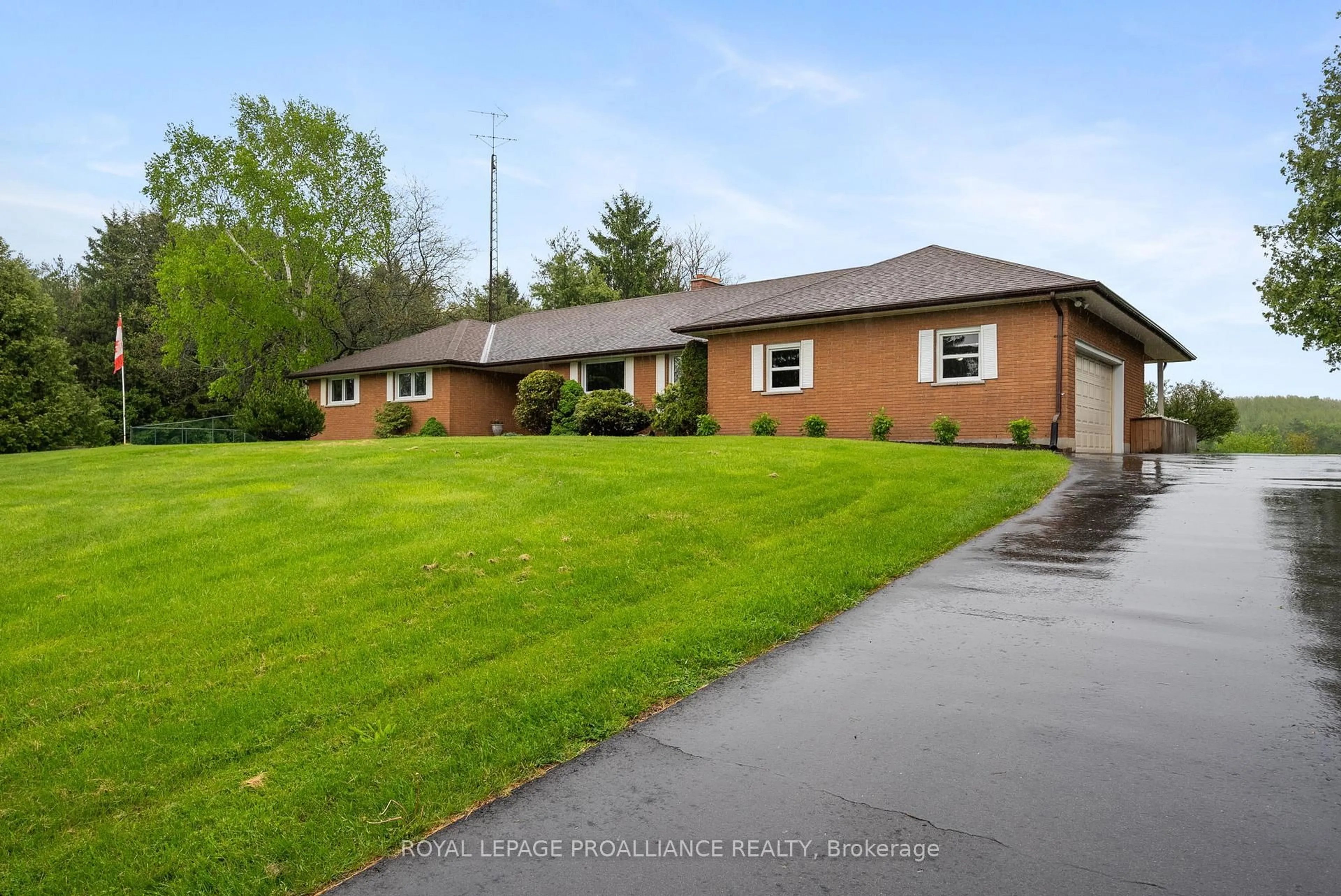 A pic from outside/outdoor area/front of a property/back of a property/a pic from drone, street for 7603 Bethel Grove Rd, Hamilton Township Ontario K9A 4J7