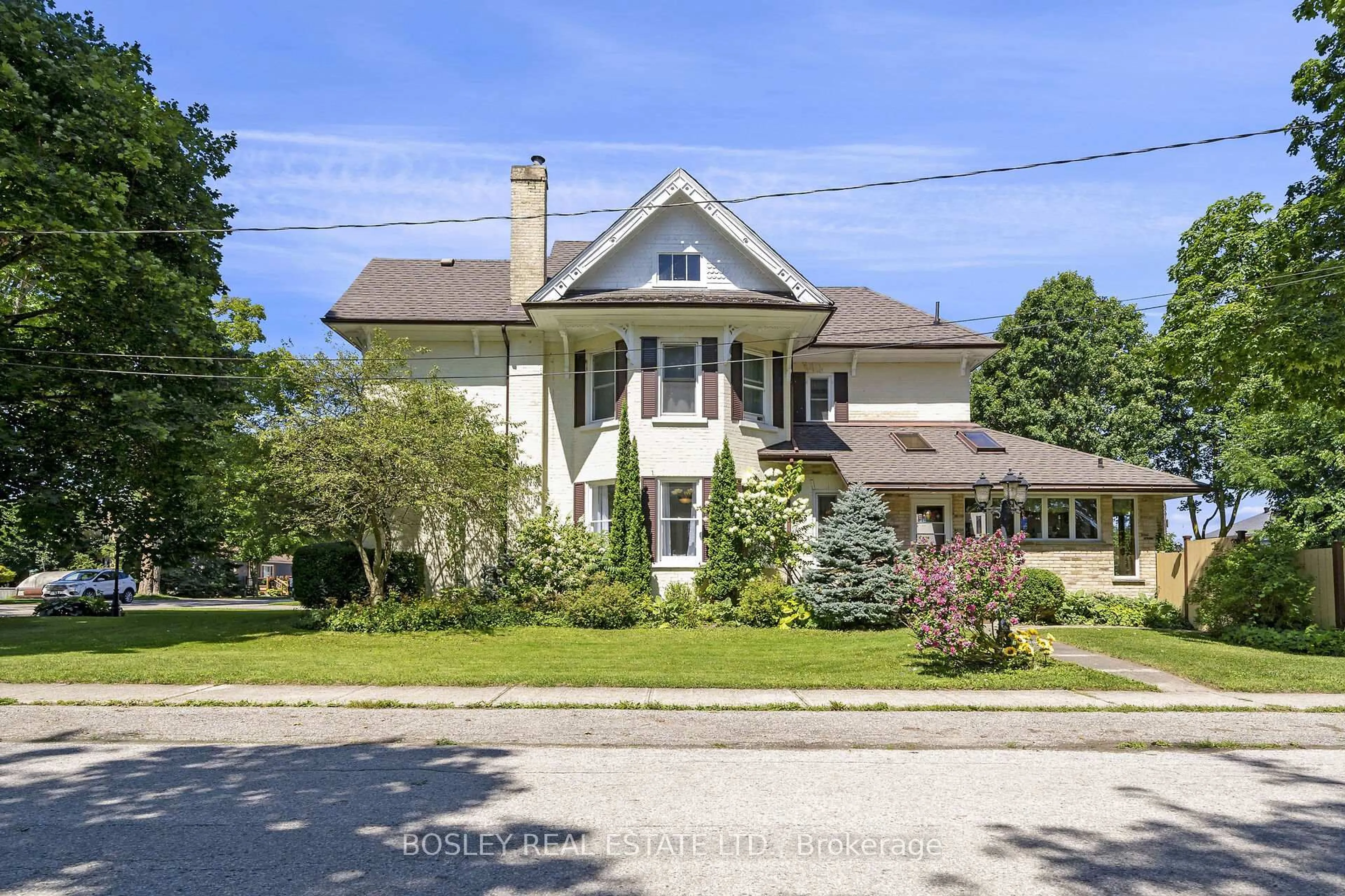 A pic from outside/outdoor area/front of a property/back of a property/a pic from drone, street for 135 Webb St, Minto Ontario N0G 1Z0