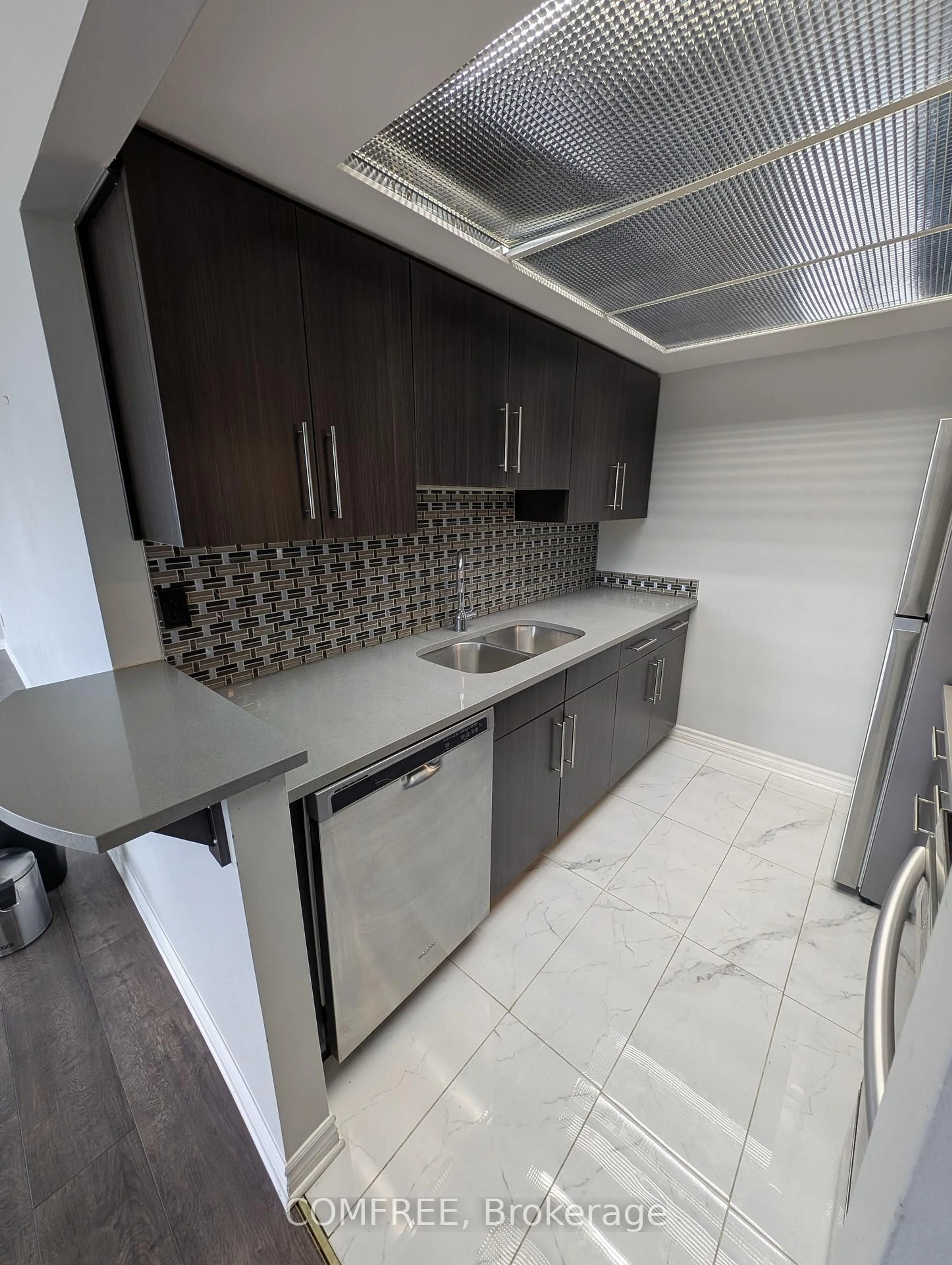 Standard kitchen, ceramic/tile floor for 165 Ontario St #701, Kingston Ontario K7L 2Y6