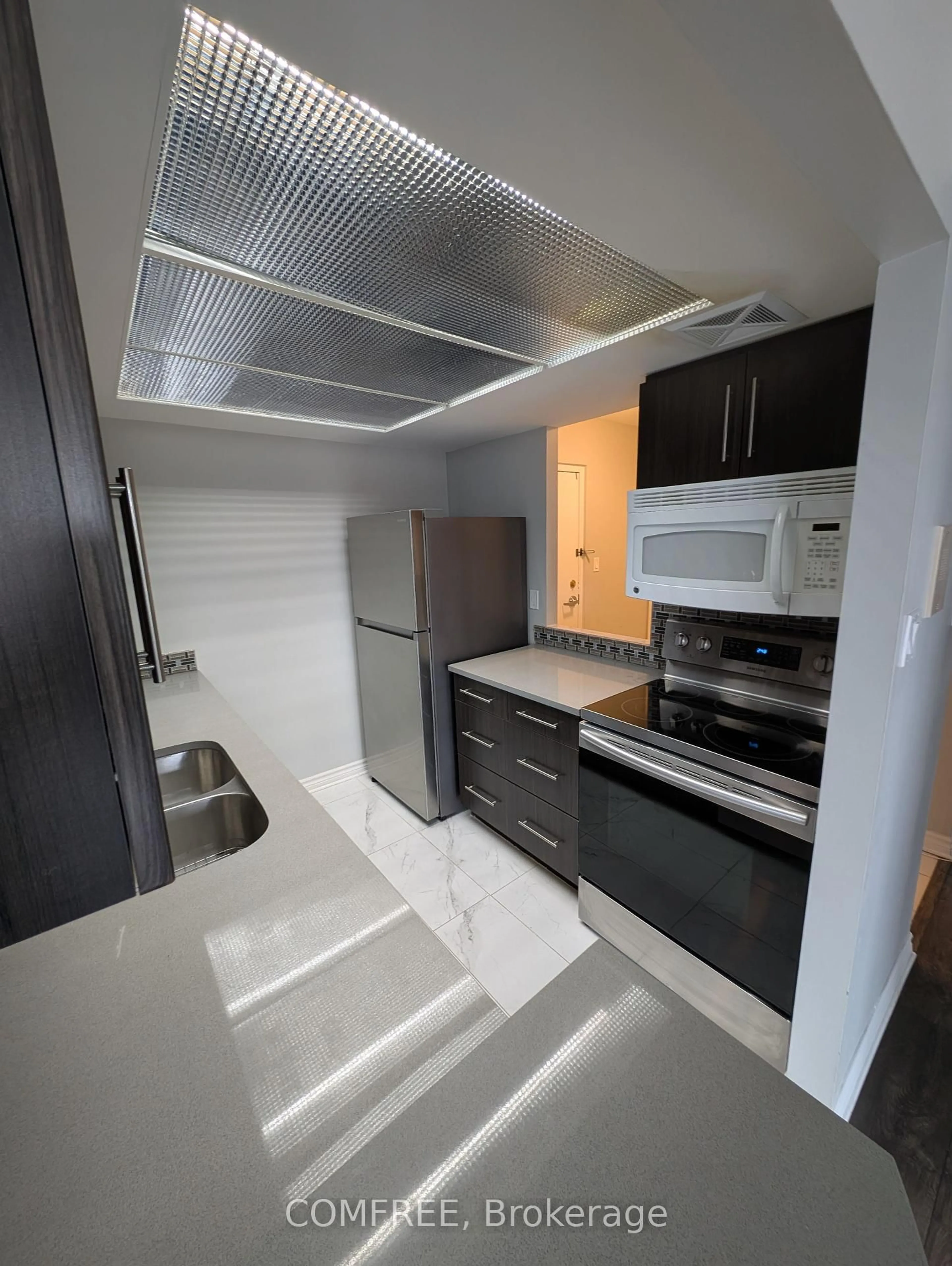 Standard kitchen, ceramic/tile floor for 165 Ontario St #701, Kingston Ontario K7L 2Y6