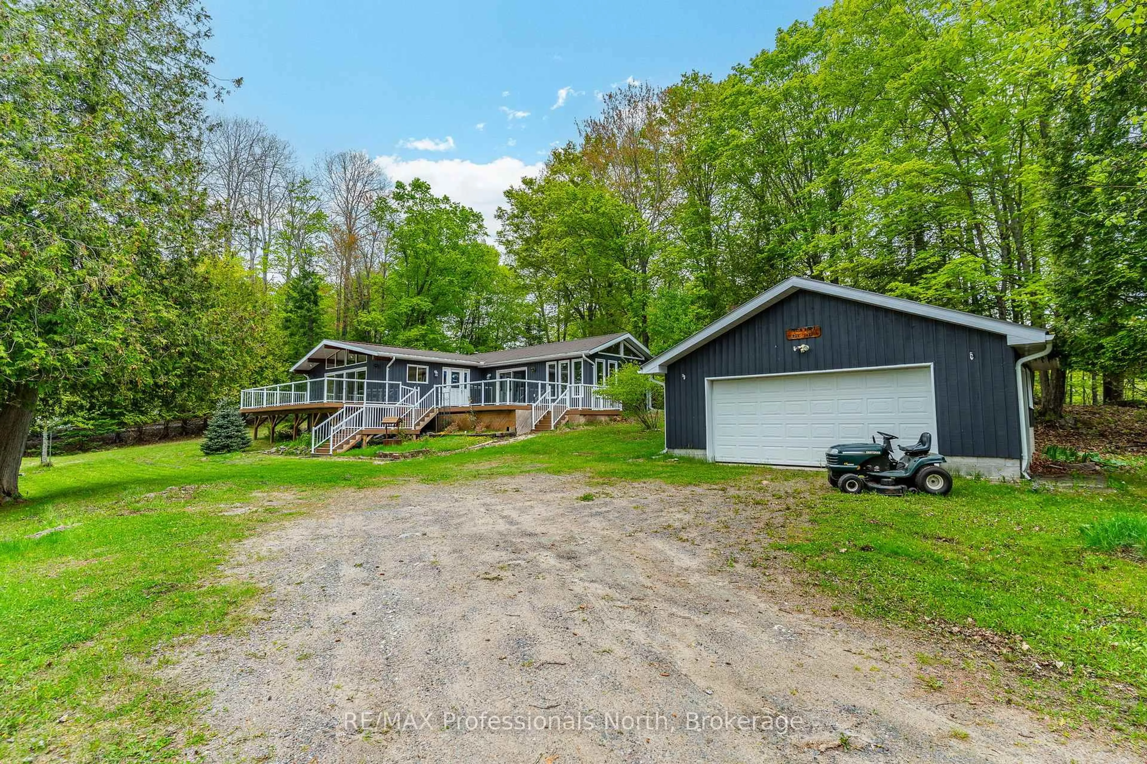 A pic from outside/outdoor area/front of a property/back of a property/a pic from drone, water/lake/river/ocean view for 3539 County Road 21 N/A, Minden Hills Ontario K0M 1S0