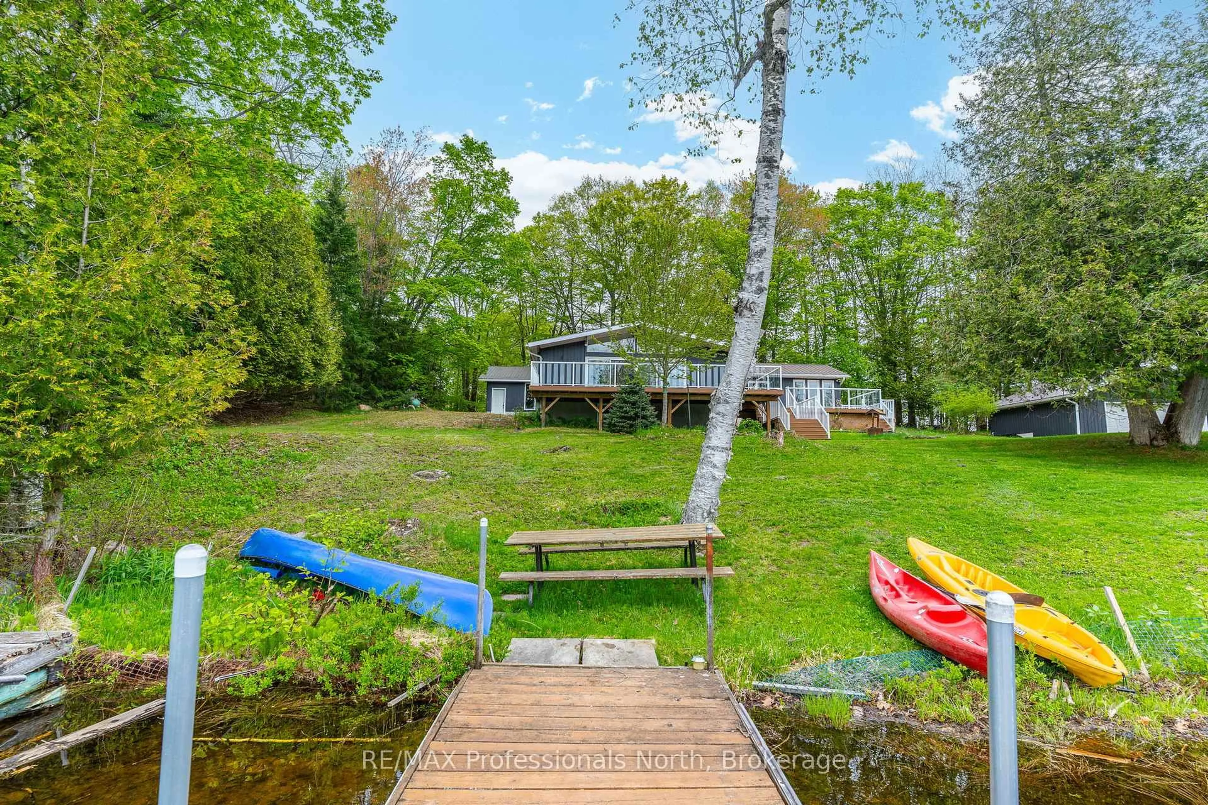 A pic from outside/outdoor area/front of a property/back of a property/a pic from drone, water/lake/river/ocean view for 3539 County Road 21 N/A, Minden Hills Ontario K0M 1S0