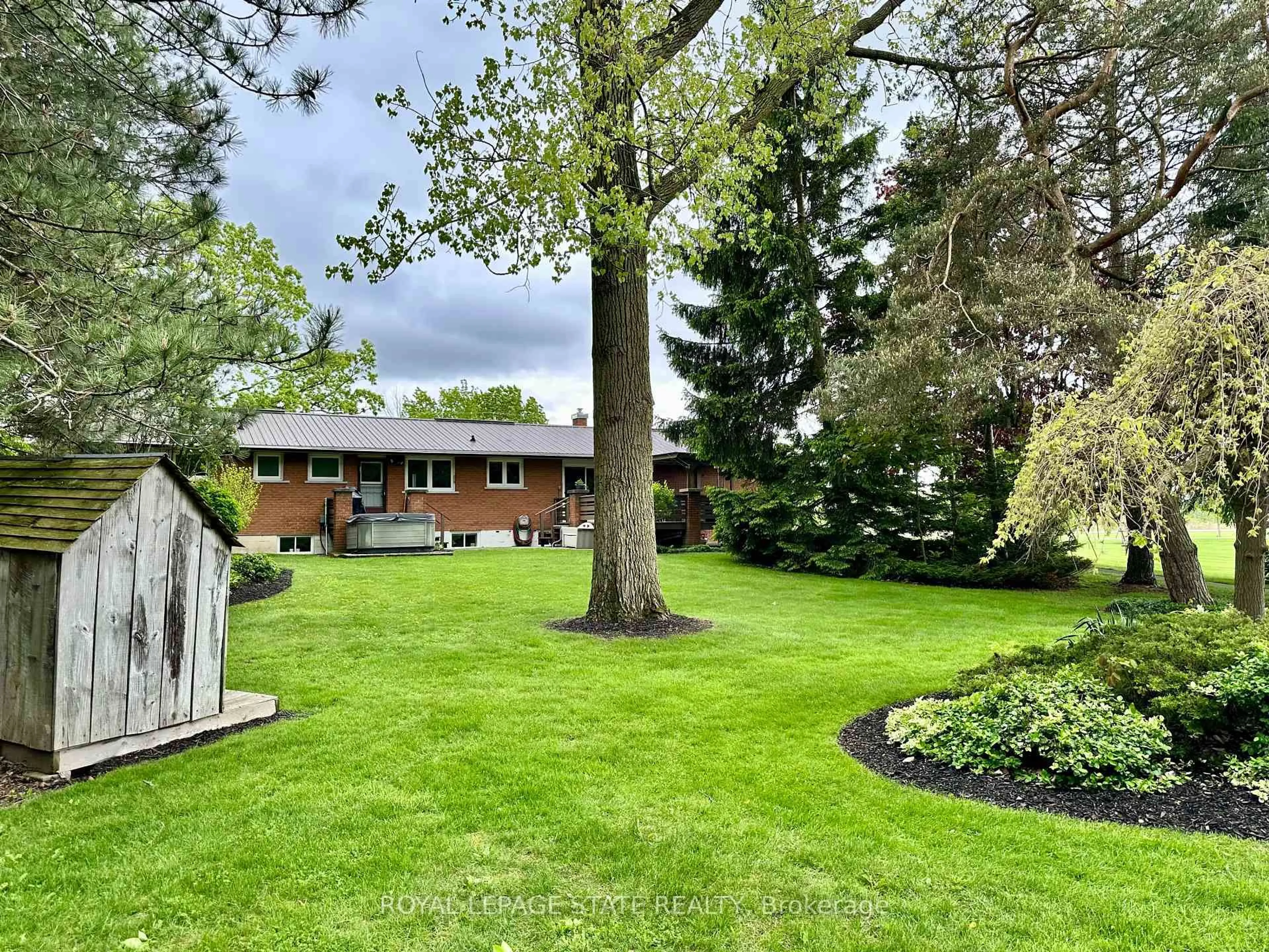 A pic from outside/outdoor area/front of a property/back of a property/a pic from drone, forest/trees view for 1076 Diltz Rd, Haldimand Ontario N1A 2W2