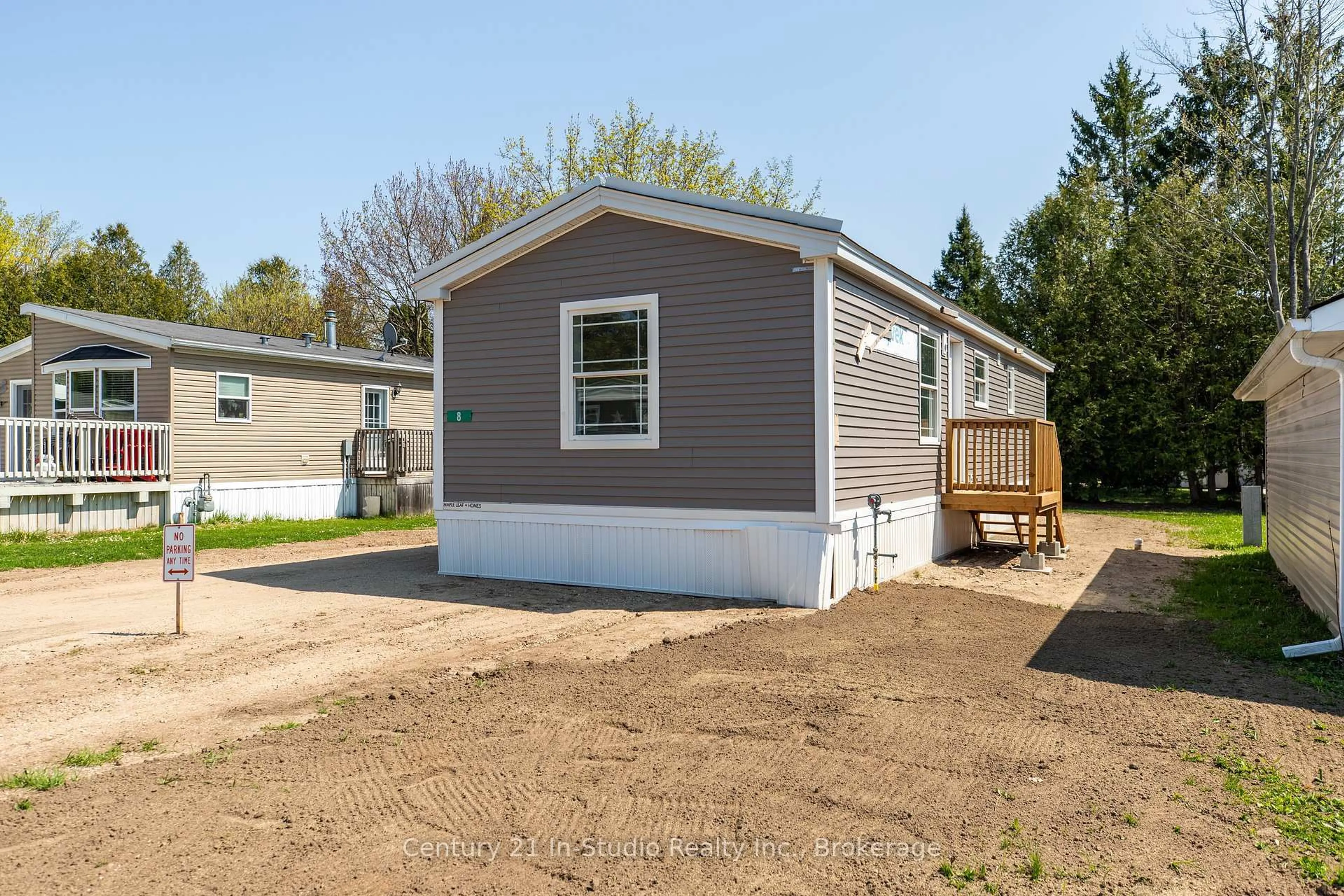 Home with vinyl exterior material, street for 8 Sussex Sq, Georgian Bluffs Ontario N4K 5N5