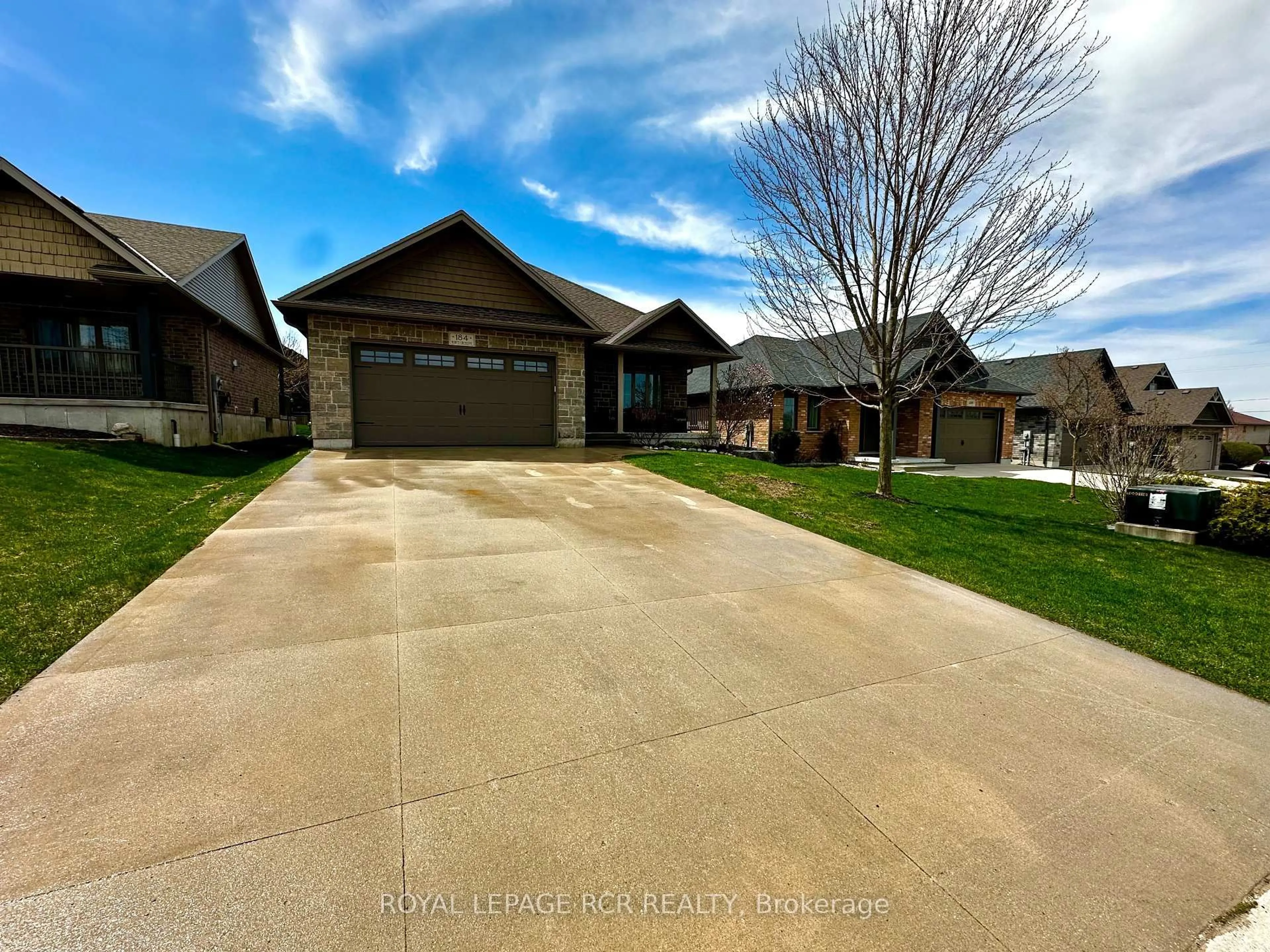 A pic from outside/outdoor area/front of a property/back of a property/a pic from drone, street for 184 Ruby's Cres, Wellington North Ontario N0G 2L2