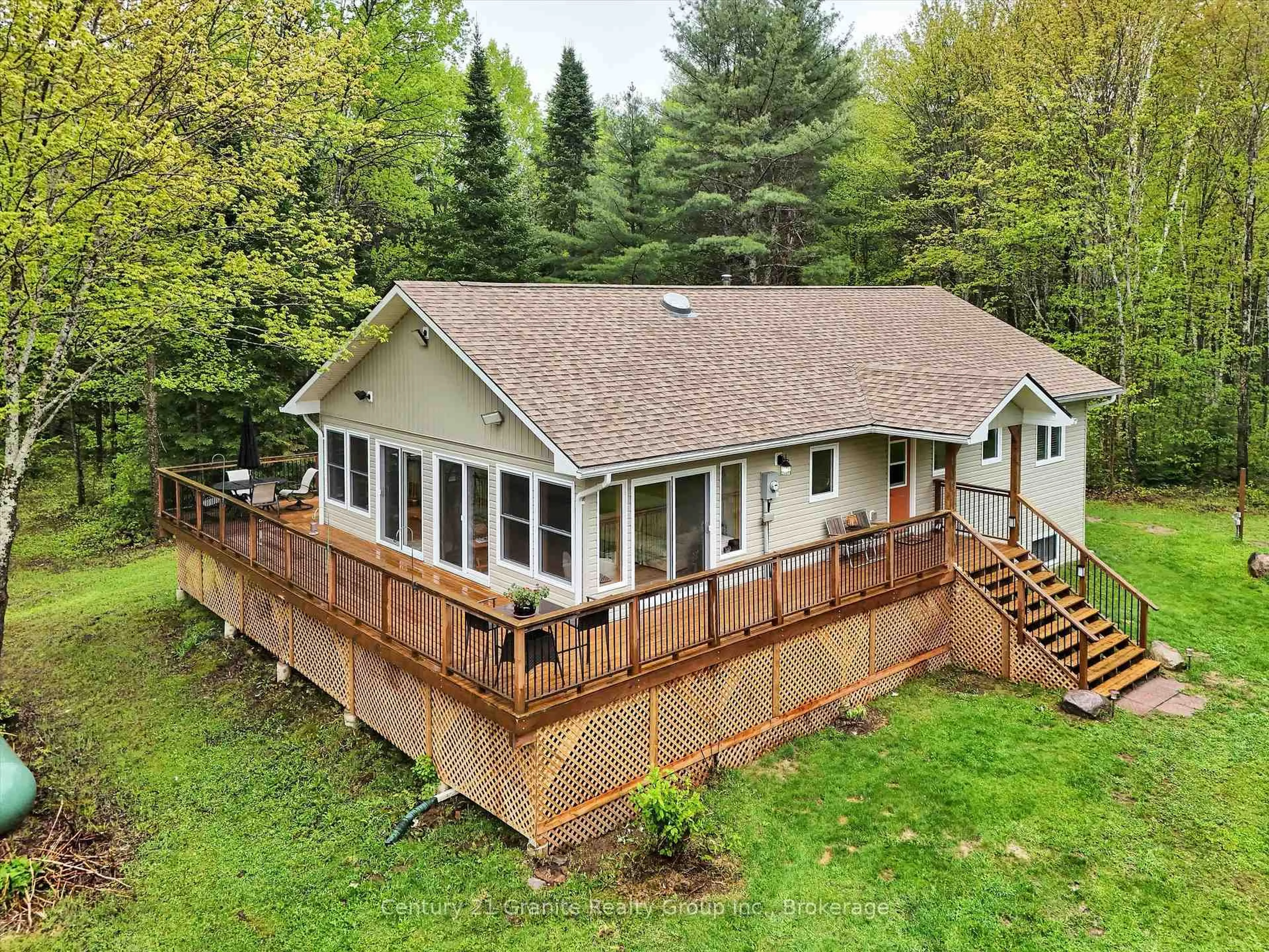 A pic from outside/outdoor area/front of a property/back of a property/a pic from drone, water/lake/river/ocean view for 2302 Buckslide Rd, Algonquin Highlands Ontario K0M 1J1