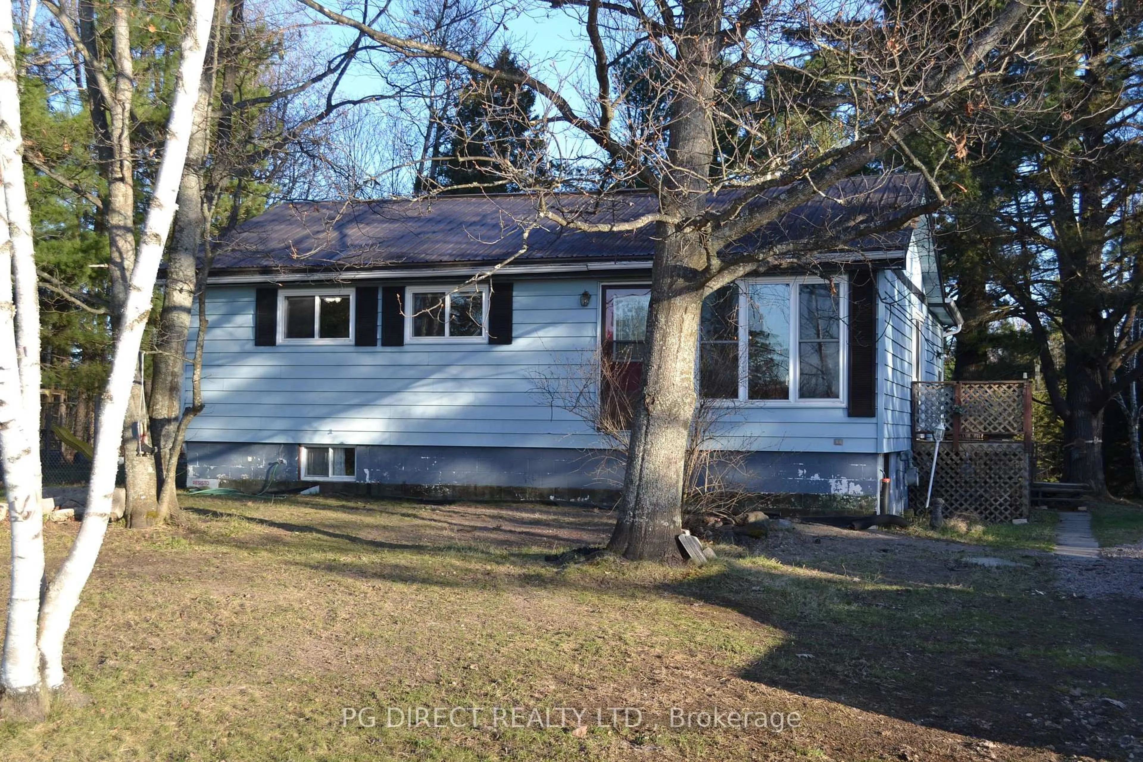 Home with vinyl exterior material, street for 14 Talon Lake Rd, Bonfield Ontario P0H 2E0