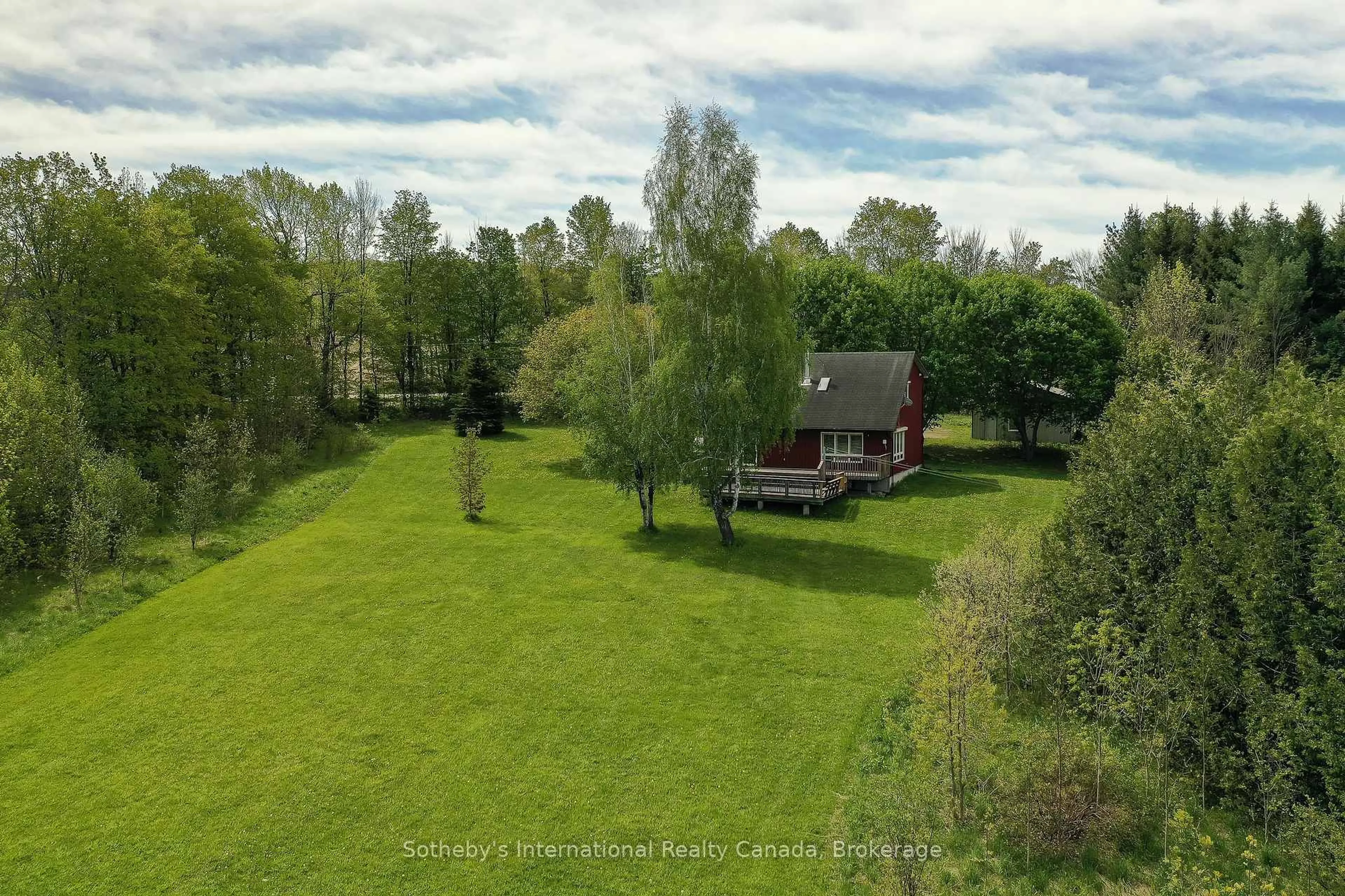 A pic from outside/outdoor area/front of a property/back of a property/a pic from drone, water/lake/river/ocean view for 608173 12th Sdrd, Blue Mountains Ontario N0H 1J0