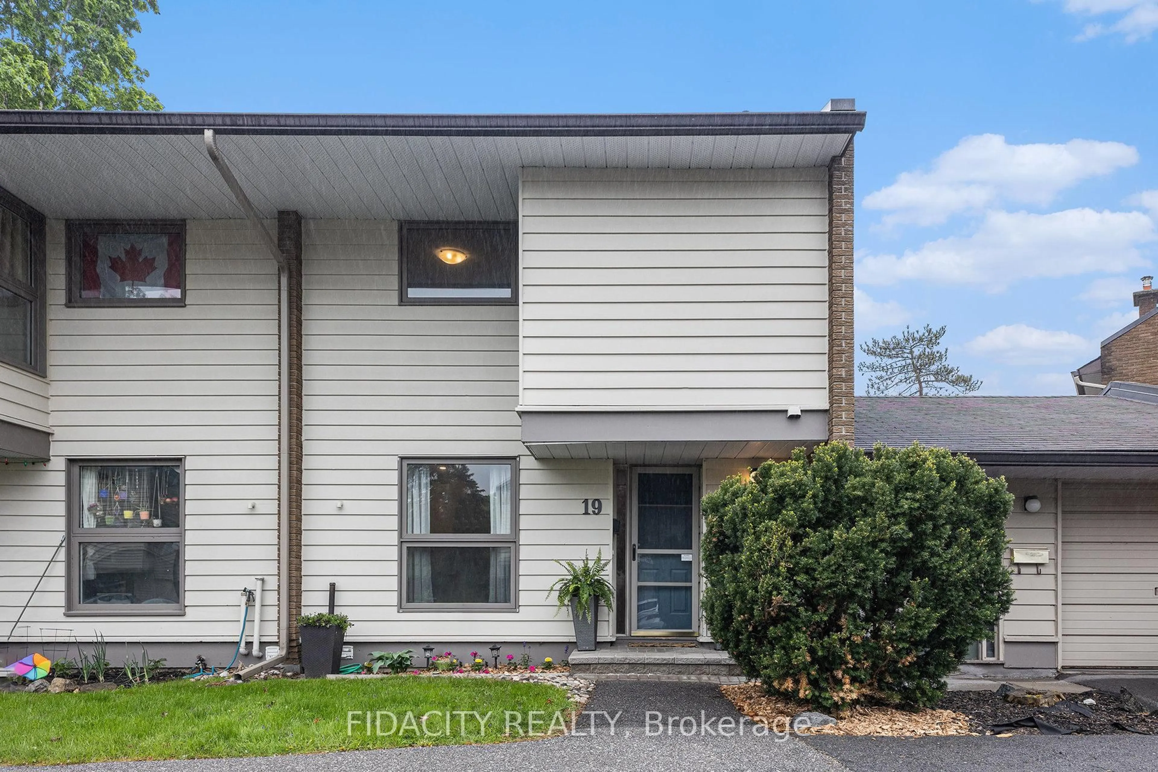 Home with vinyl exterior material, street for 19 Carmichael Crt, Ottawa Ontario K2K 1K1