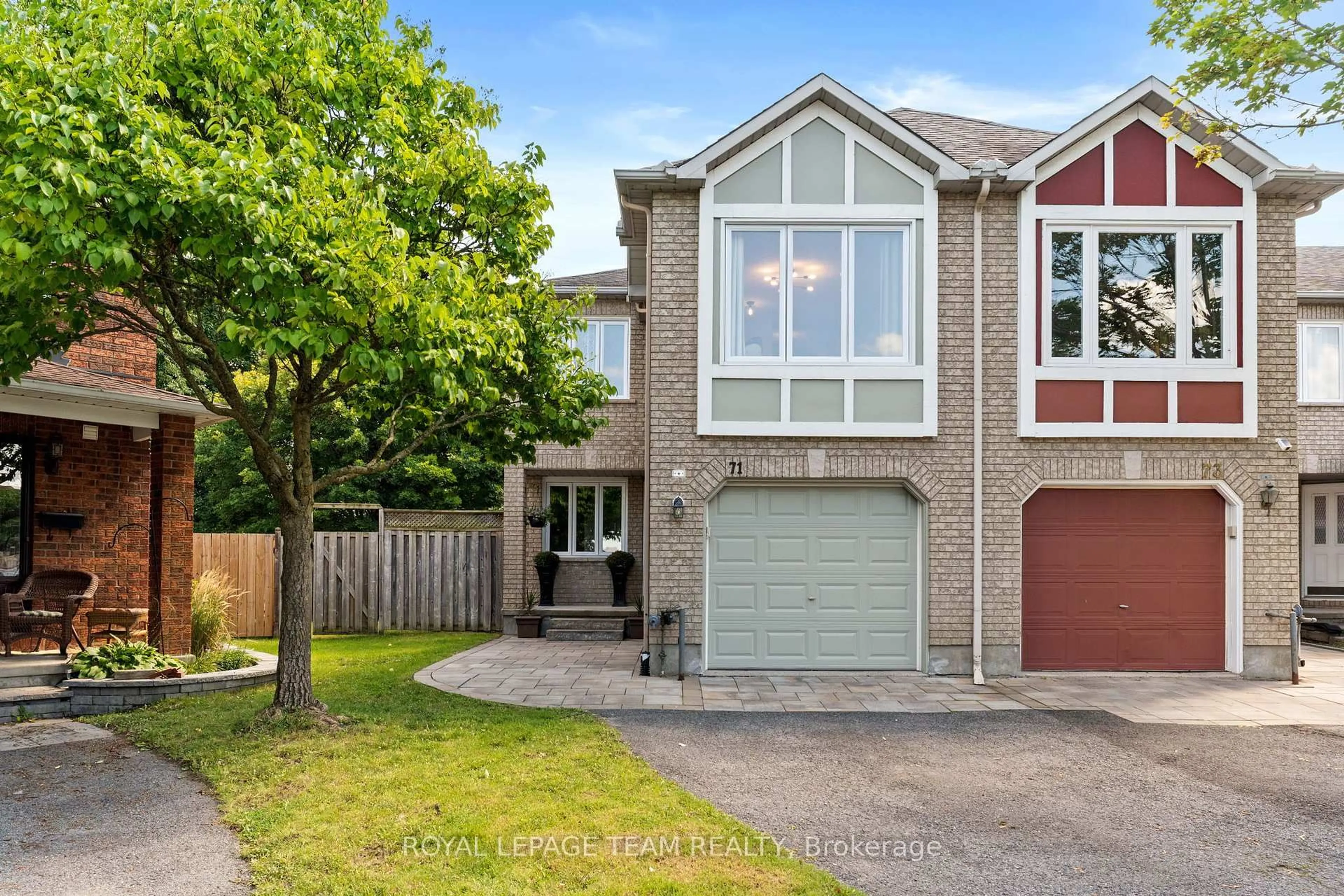Home with brick exterior material, street for 71 Grenadier Way, Ottawa Ontario K2J 4L4