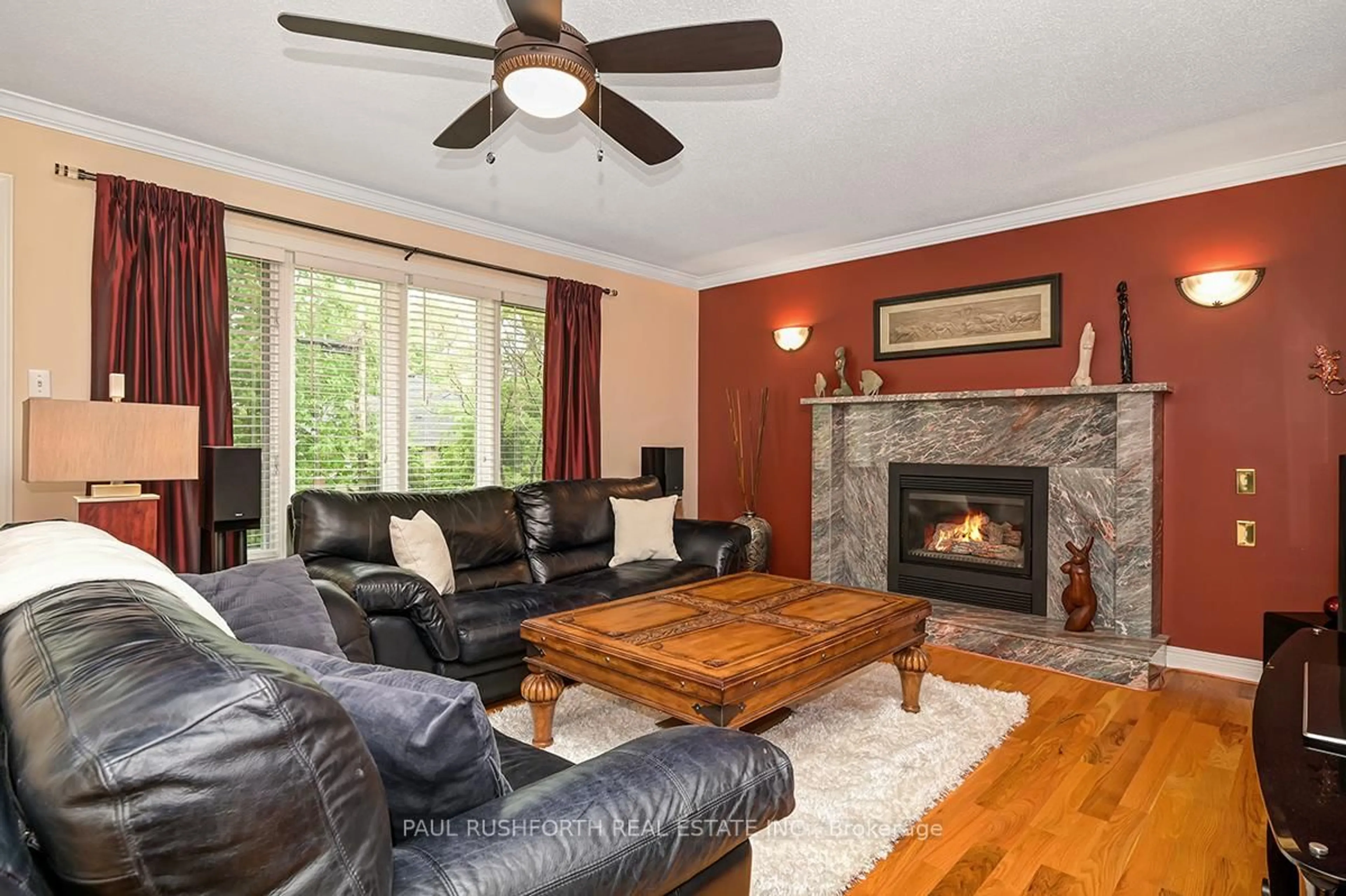 Living room with furniture, wood/laminate floor for 1248 Anoka St, Ottawa Ontario K1V 6C6