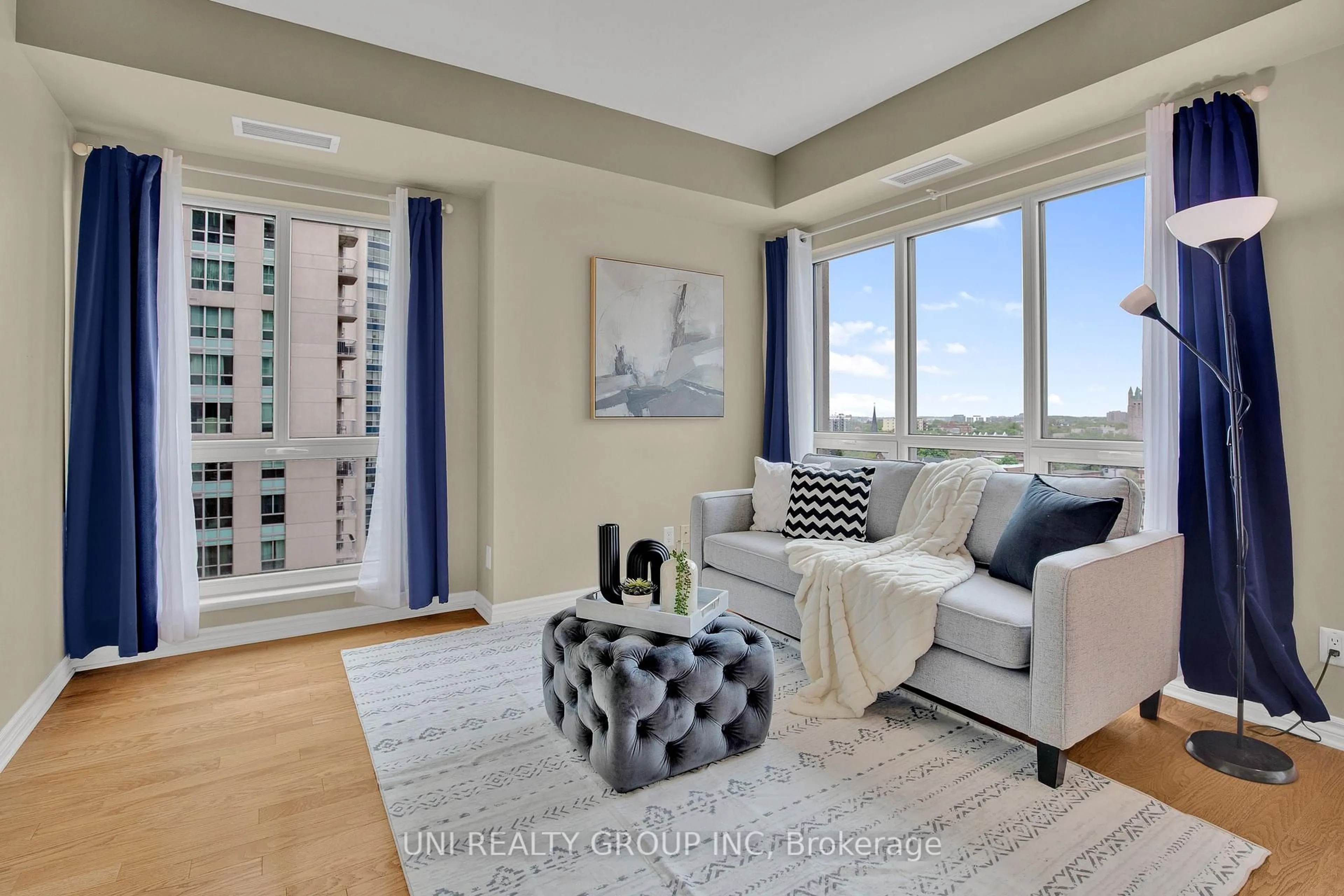 Living room with furniture, unknown for 200 Rideau St #1209, Ottawa Ontario K1N 5Y1