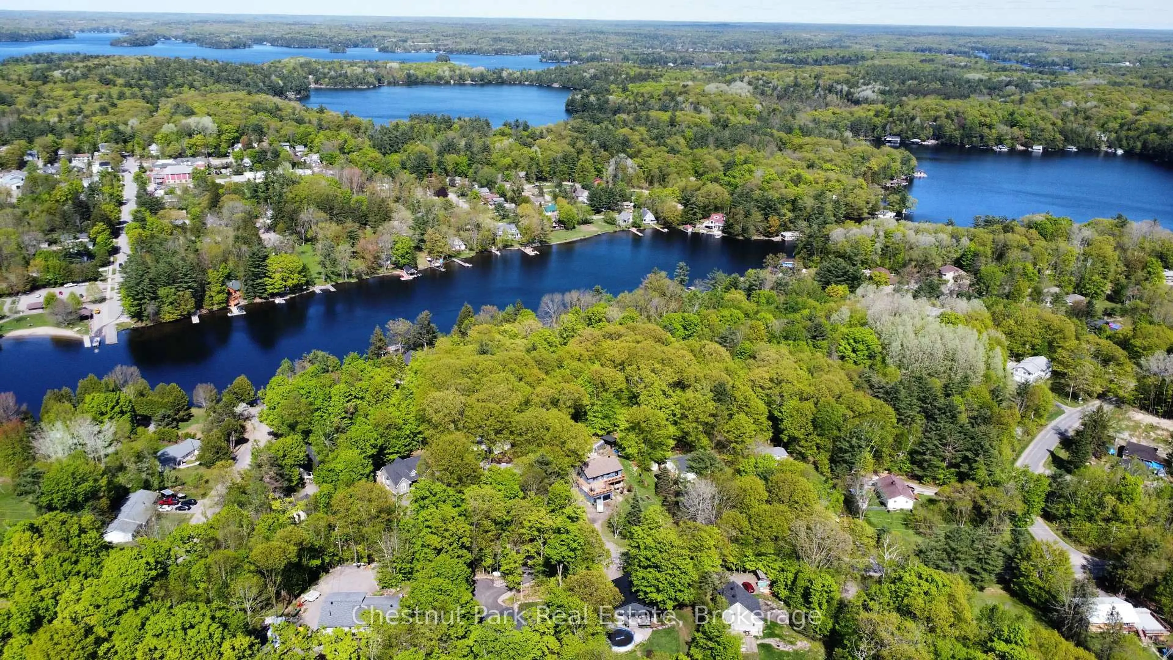 A pic from outside/outdoor area/front of a property/back of a property/a pic from drone, water/lake/river/ocean view for 39 Todholm Dr, Muskoka Lakes Ontario P0B 1J0