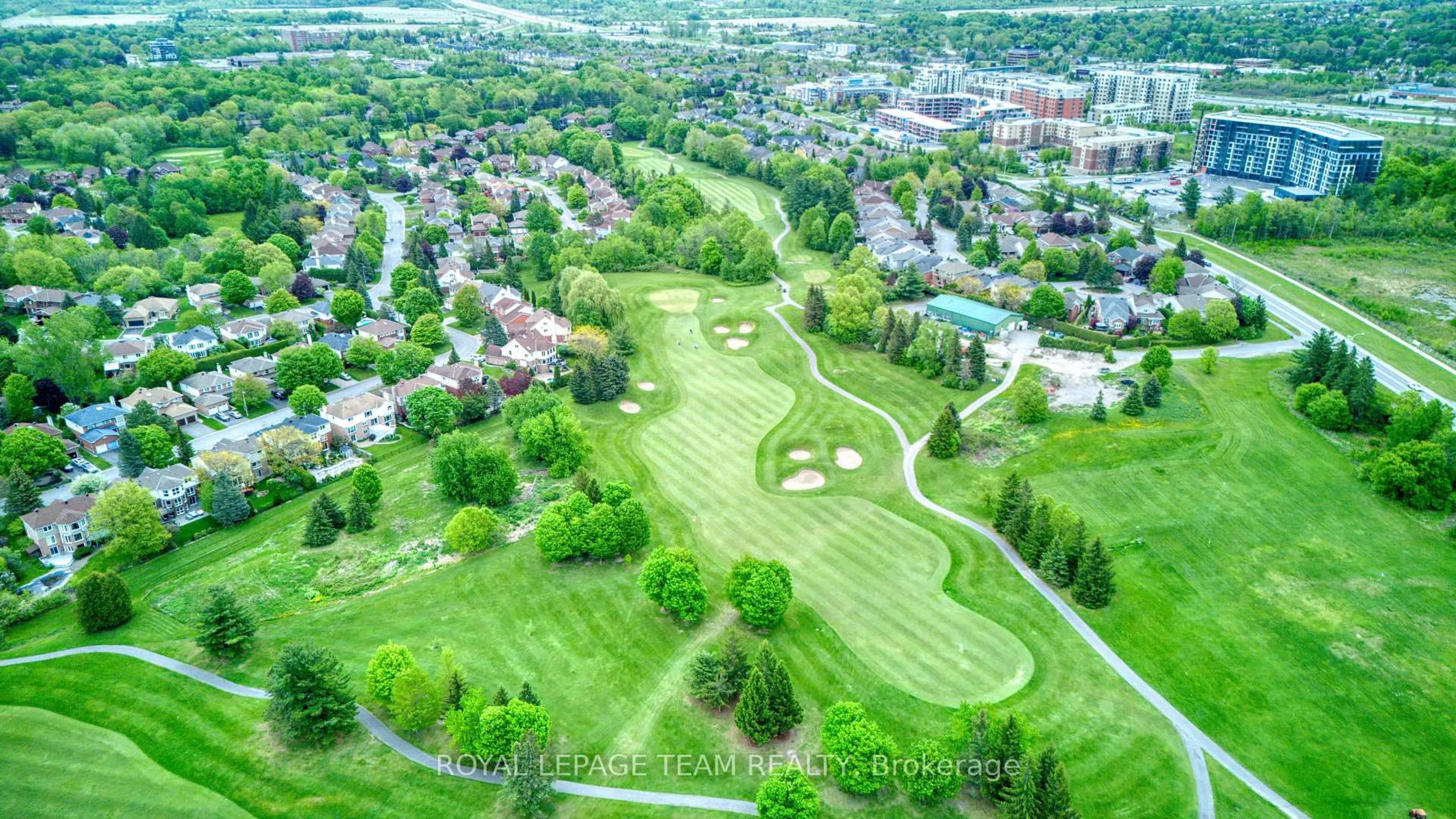 A pic from outside/outdoor area/front of a property/back of a property/a pic from drone, street for 27 Sherk Cres, Kanata Ontario K2K 2L3