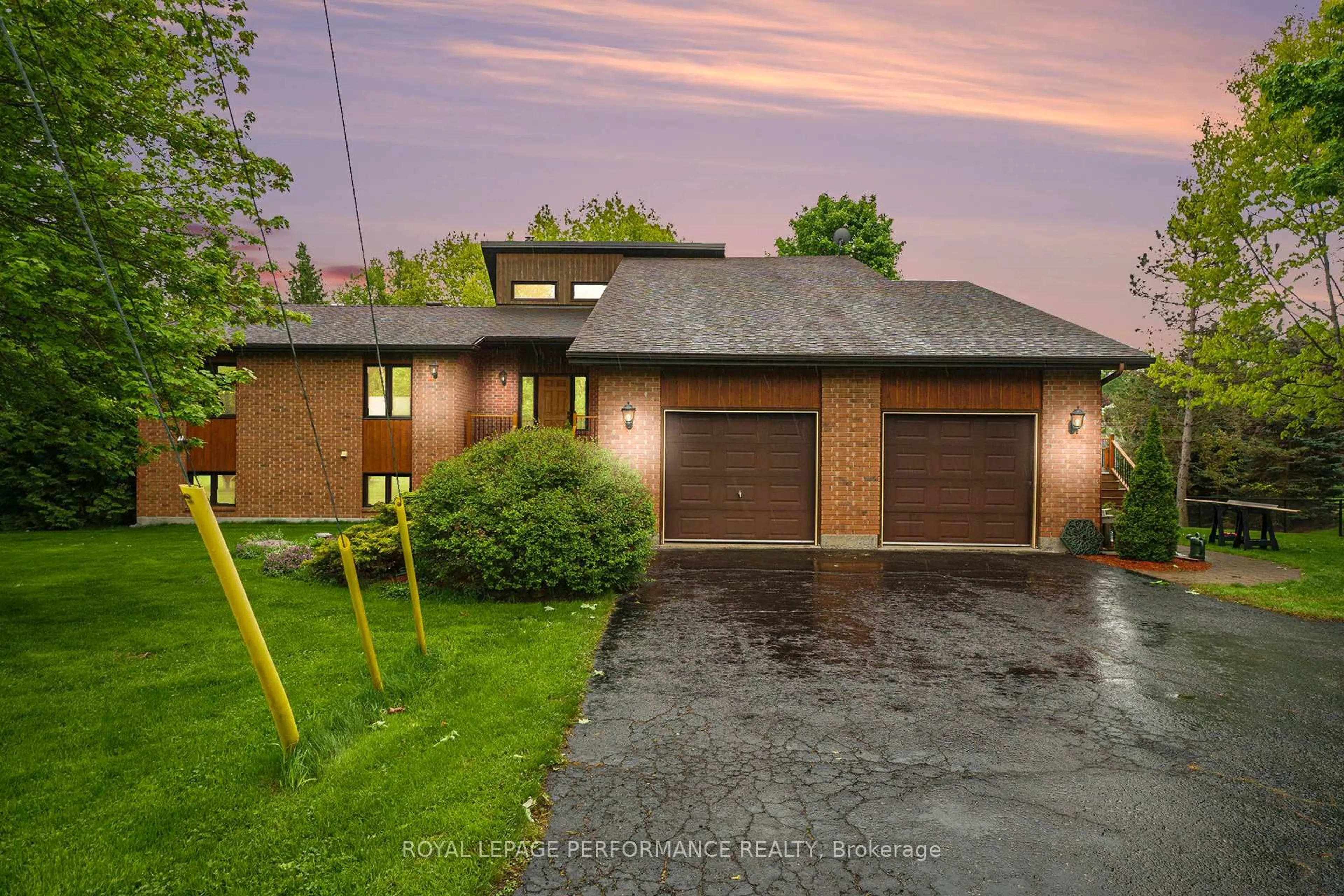 Home with brick exterior material, street for 2411 Overdale Dr, Cumberland Ontario K4C 1B8