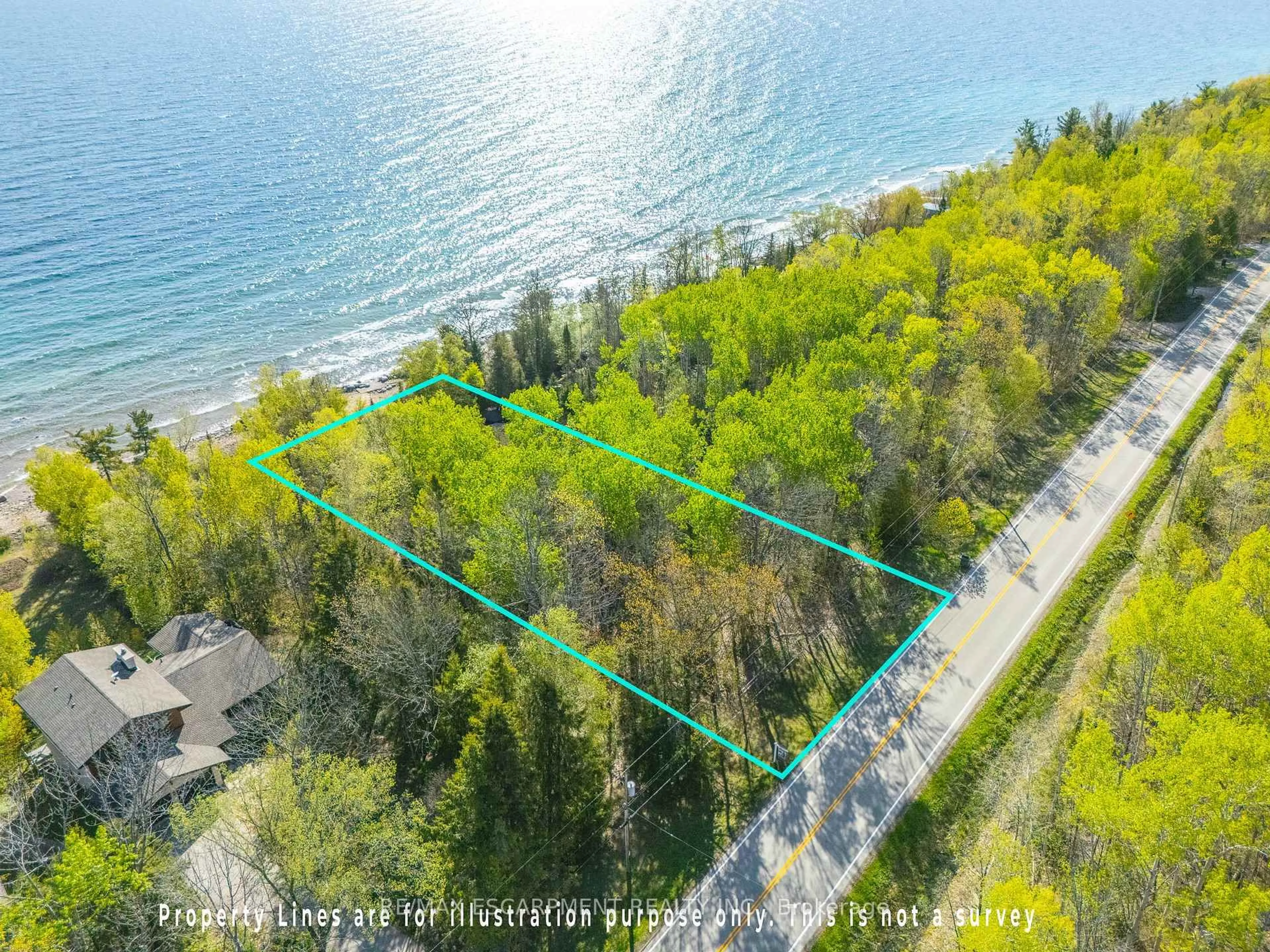 A pic from outside/outdoor area/front of a property/back of a property/a pic from drone, water/lake/river/ocean view for 504501 Grey Rd #1, Georgian Bluffs Ontario N0H 2T0