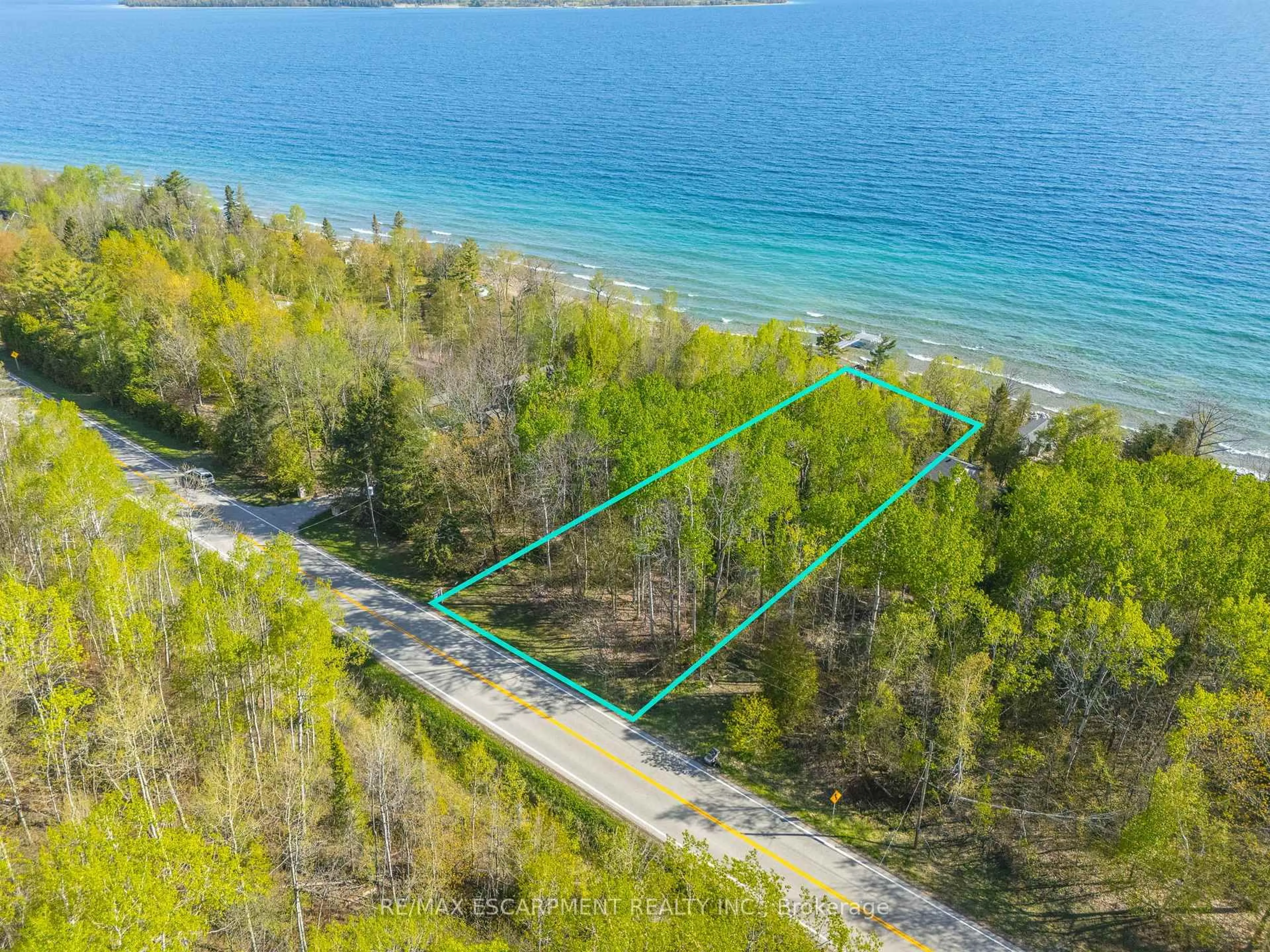 A pic from outside/outdoor area/front of a property/back of a property/a pic from drone, water/lake/river/ocean view for 504501 Grey Rd #1, Georgian Bluffs Ontario N0H 2T0
