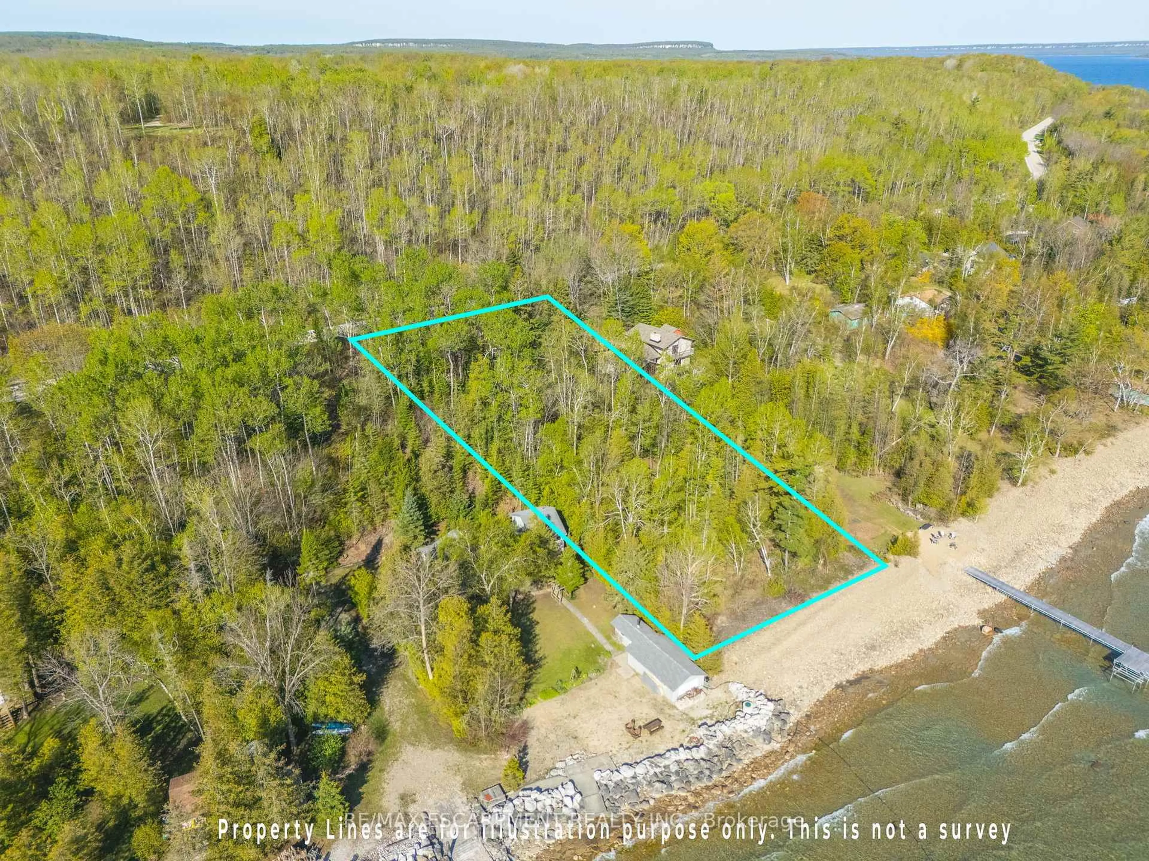 A pic from outside/outdoor area/front of a property/back of a property/a pic from drone, water/lake/river/ocean view for 504501 Grey Rd #1, Georgian Bluffs Ontario N0H 2T0
