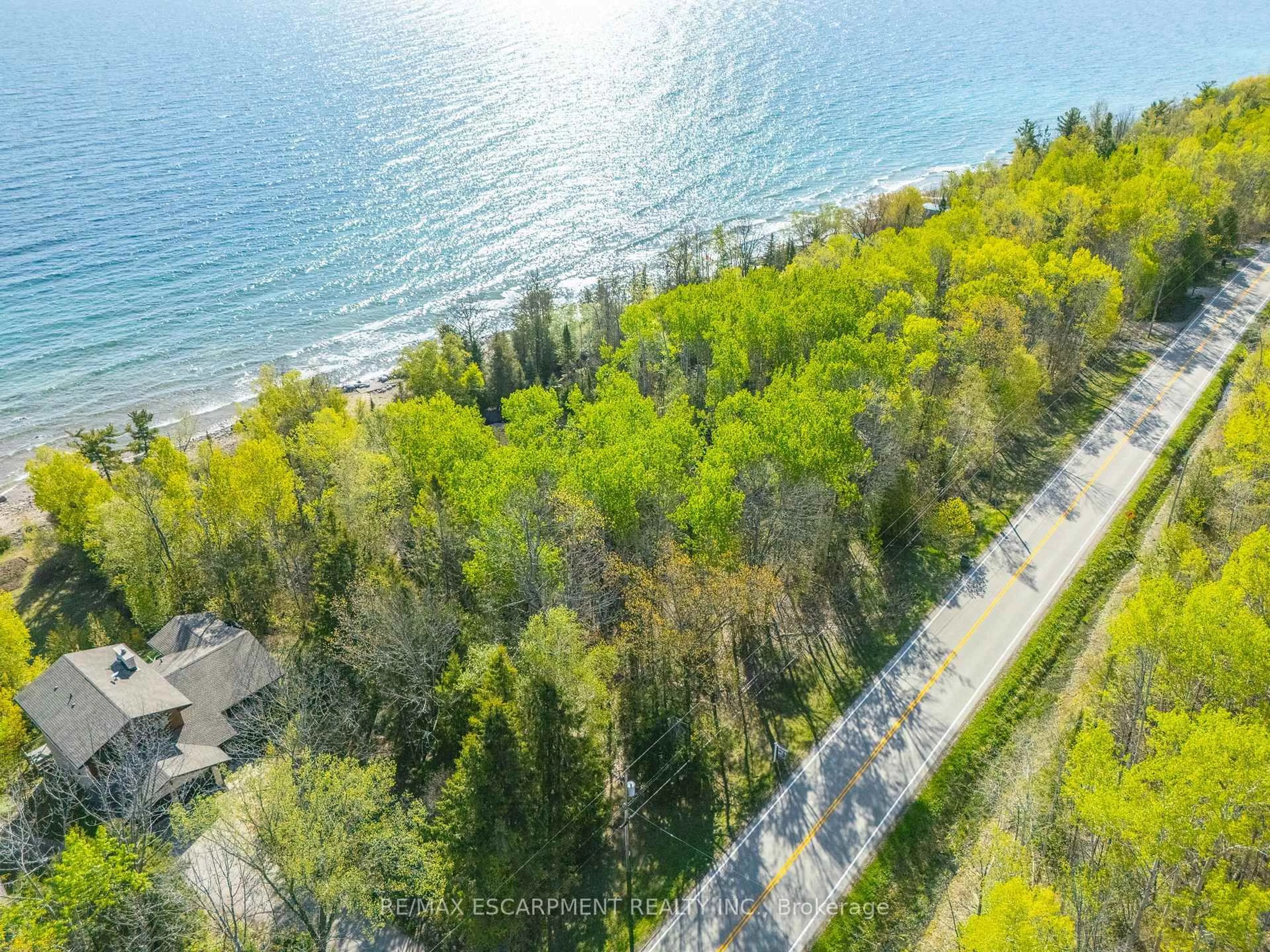 A pic from outside/outdoor area/front of a property/back of a property/a pic from drone, water/lake/river/ocean view for 504501 Grey Rd #1, Georgian Bluffs Ontario N0H 2T0