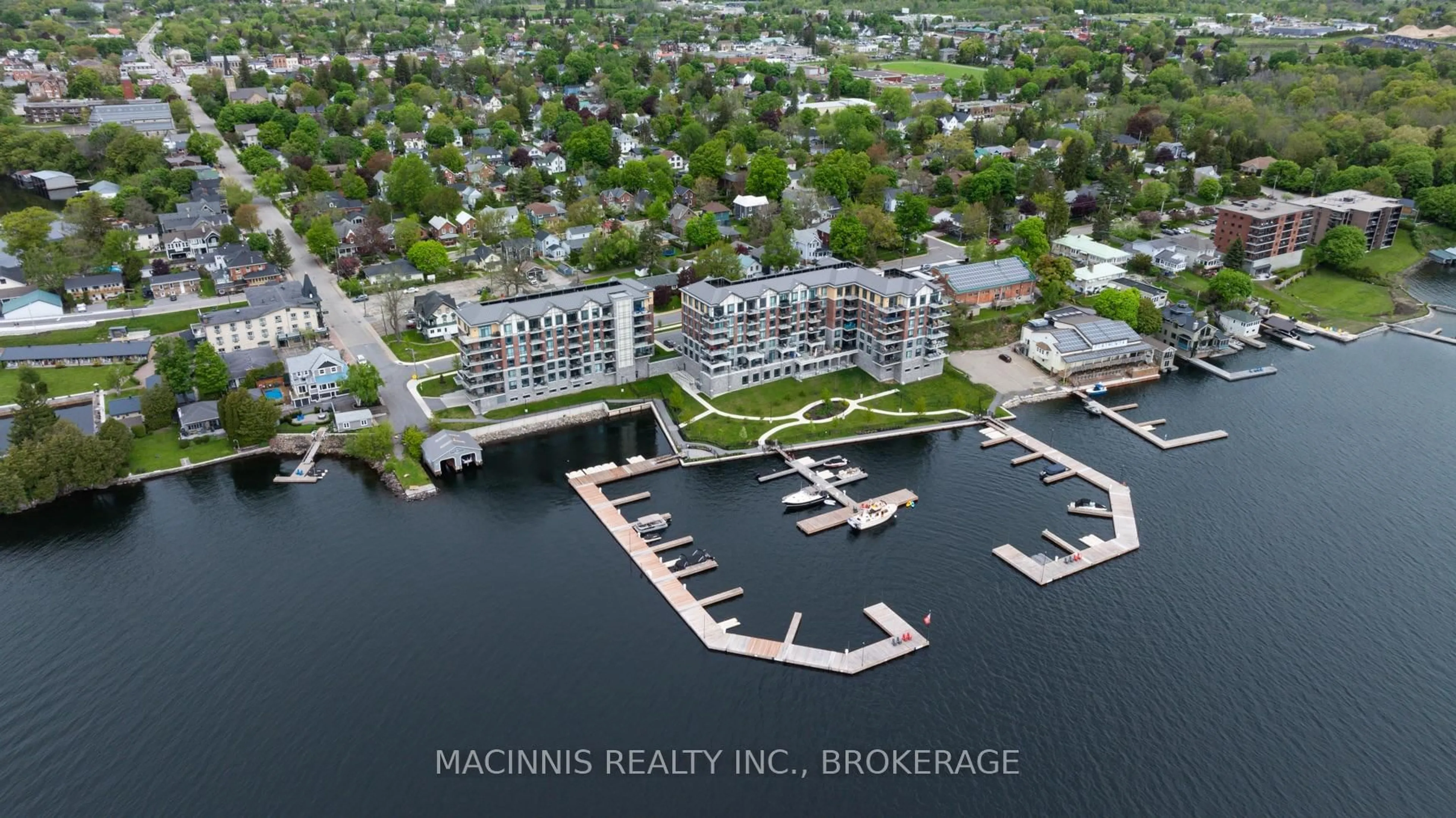 A pic from outside/outdoor area/front of a property/back of a property/a pic from drone, water/lake/river/ocean view for 129B South St #218, Gananoque Ontario K7G 0B1