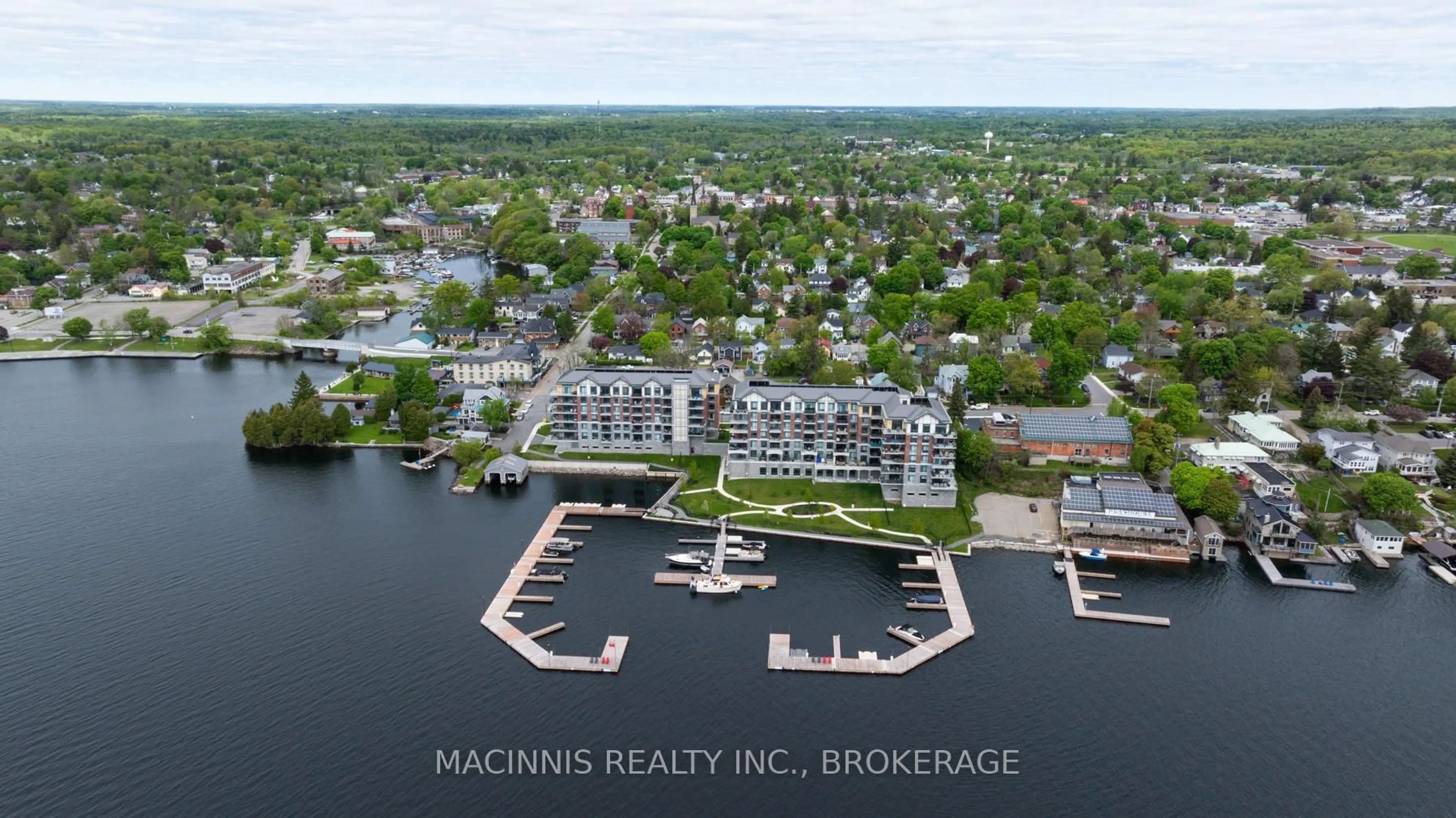 A pic from outside/outdoor area/front of a property/back of a property/a pic from drone, water/lake/river/ocean view for 129B South St #218, Gananoque Ontario K7G 0B1