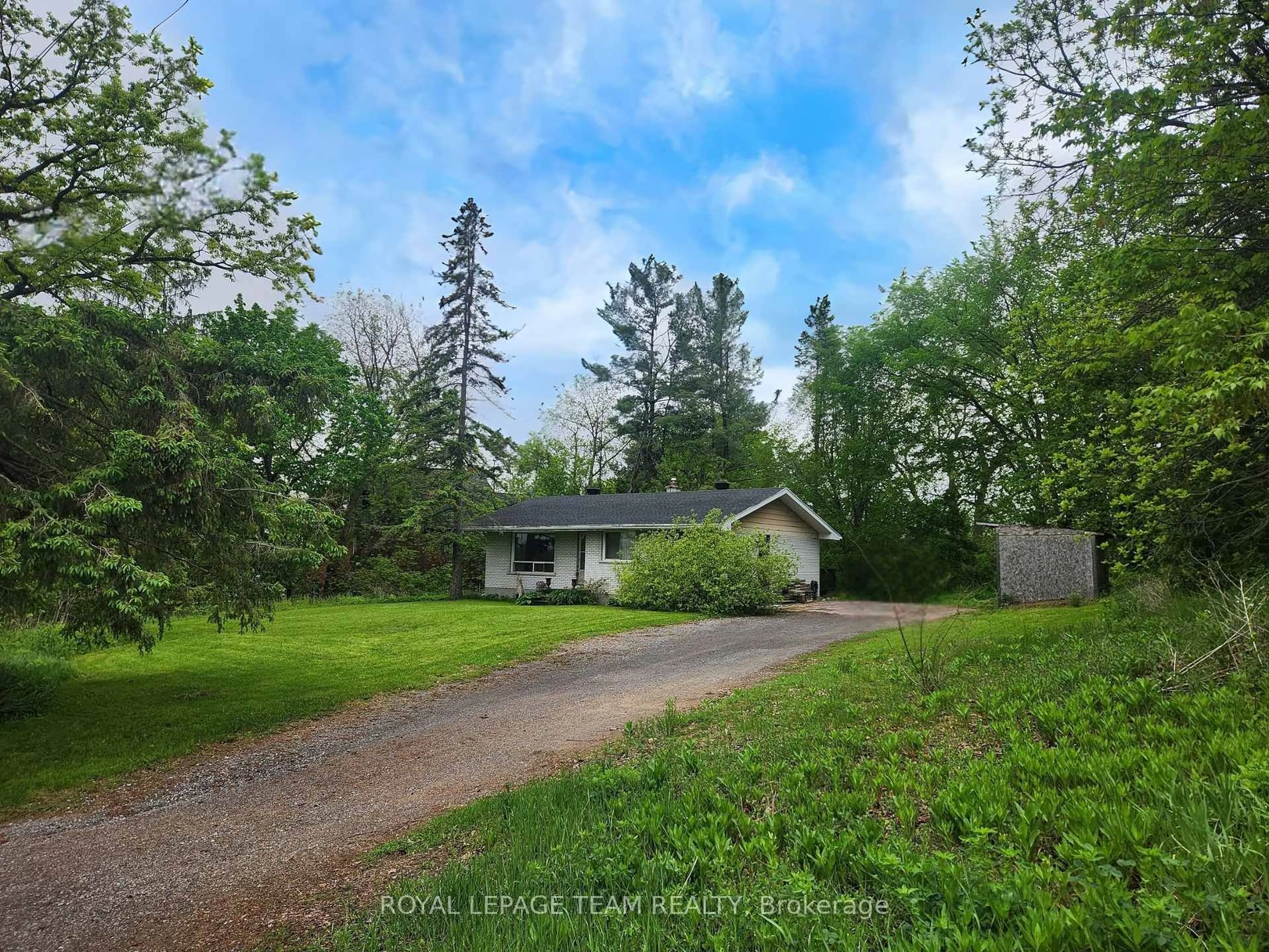 A pic from outside/outdoor area/front of a property/back of a property/a pic from drone, forest/trees view for 104 Falldown Lane, Carp Ontario K0A 1L0