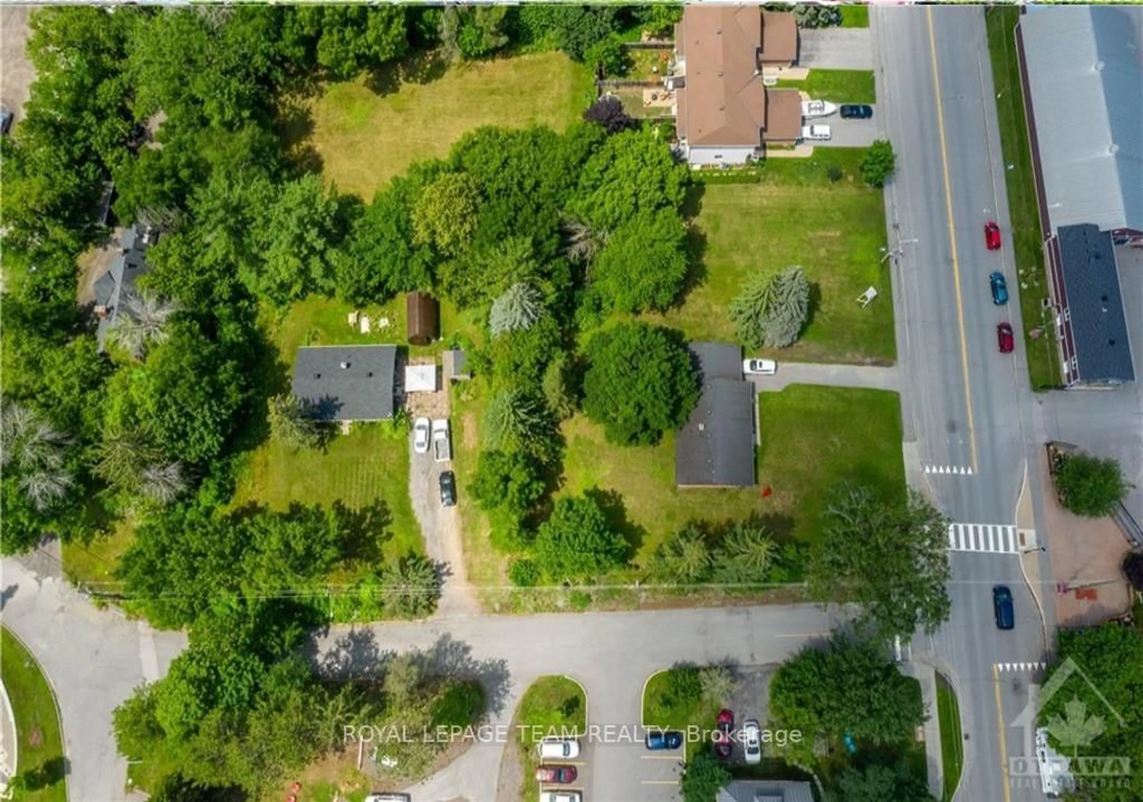 A pic from outside/outdoor area/front of a property/back of a property/a pic from drone, street for 104 Falldown Lane, Carp Ontario K0A 1L0