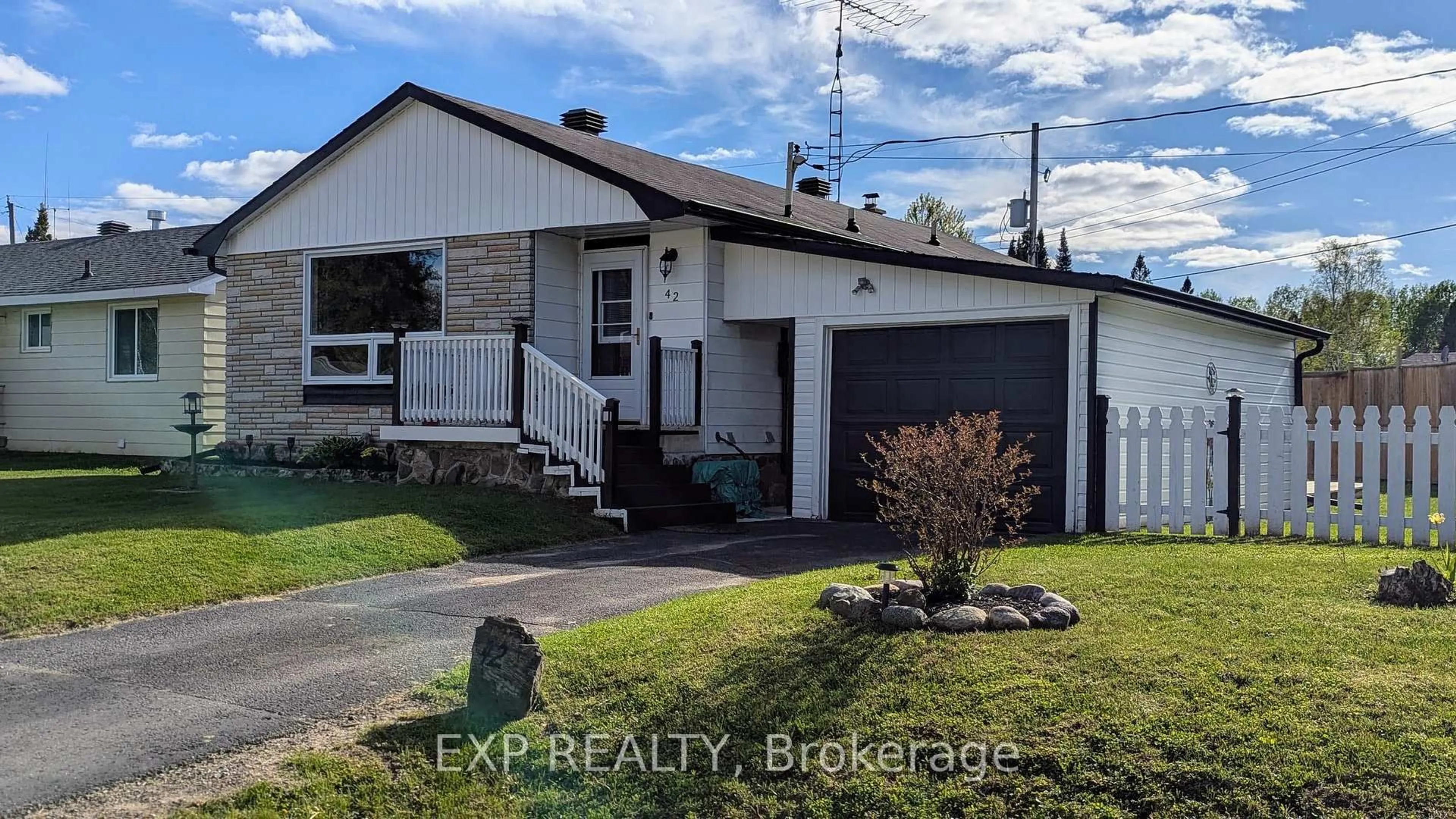 Home with vinyl exterior material, street for 42 Larch St, Highlands East Ontario K0L 1M0