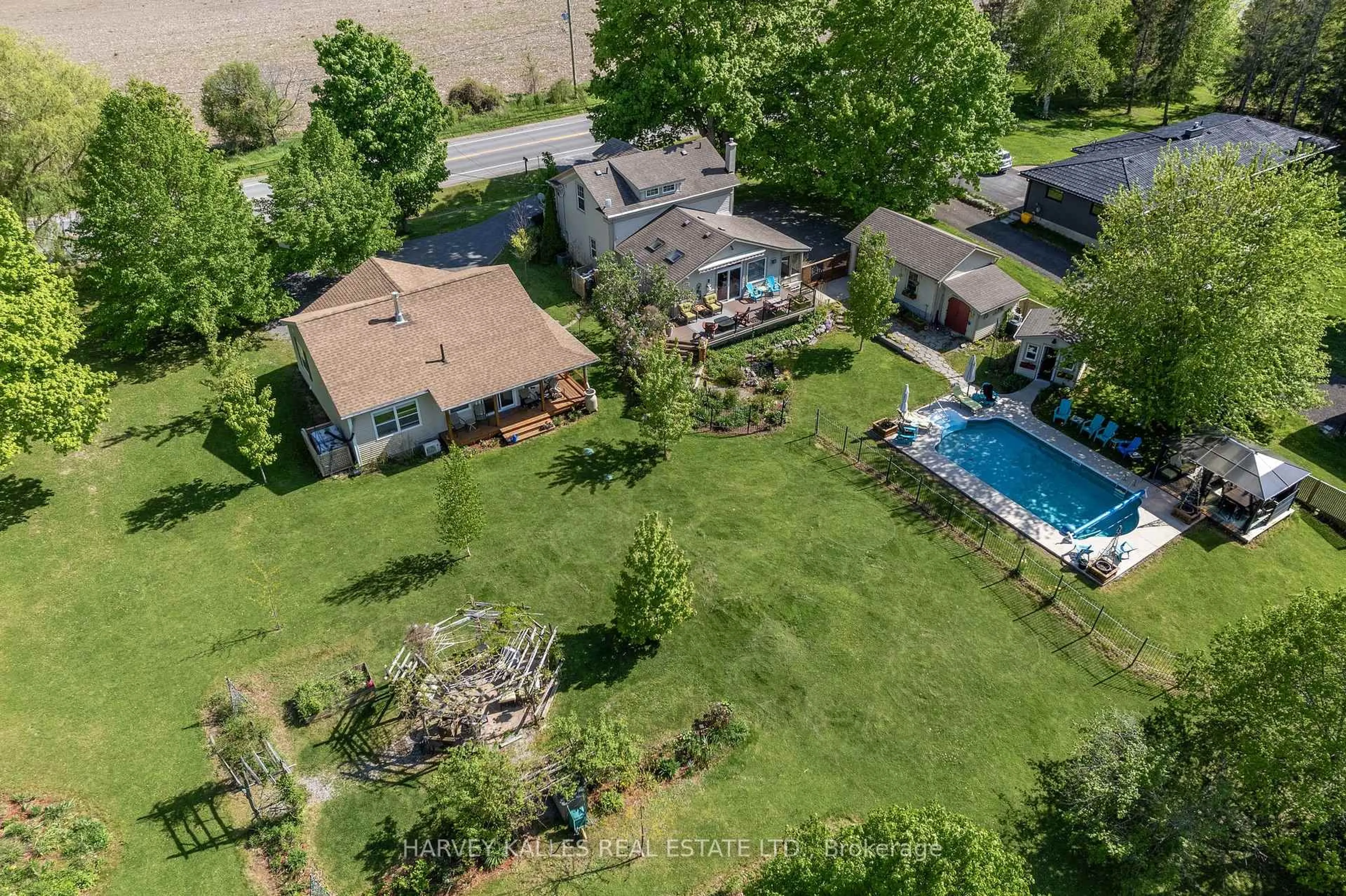 A pic from outside/outdoor area/front of a property/back of a property/a pic from drone, water/lake/river/ocean view for 14782 Loyalist Pkwy, Prince Edward County Ontario K0K 1G0