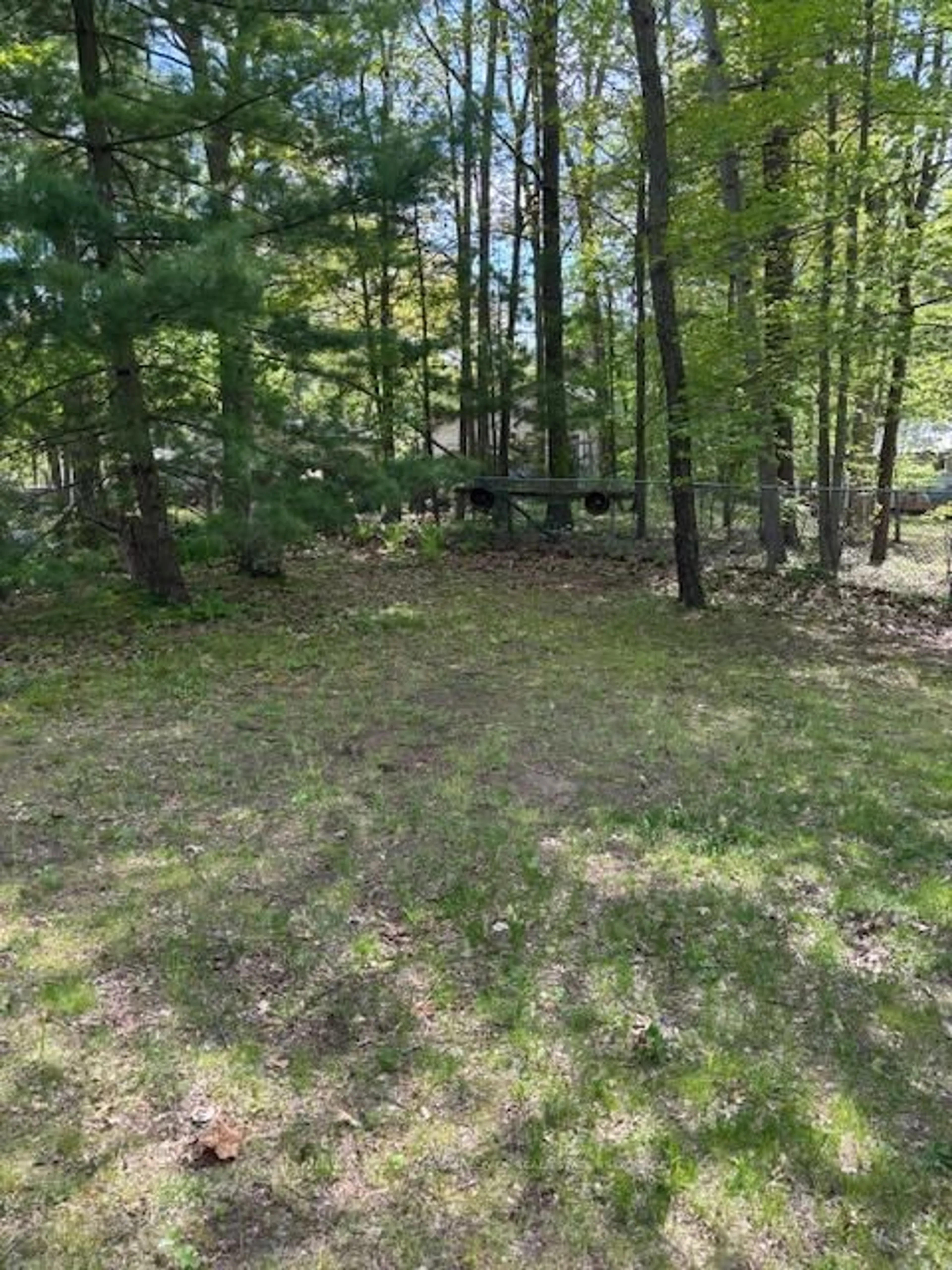 A pic from outside/outdoor area/front of a property/back of a property/a pic from drone, forest/trees view for 9707 Army Camp Rd, Lambton Shores Ontario N0N 1J0