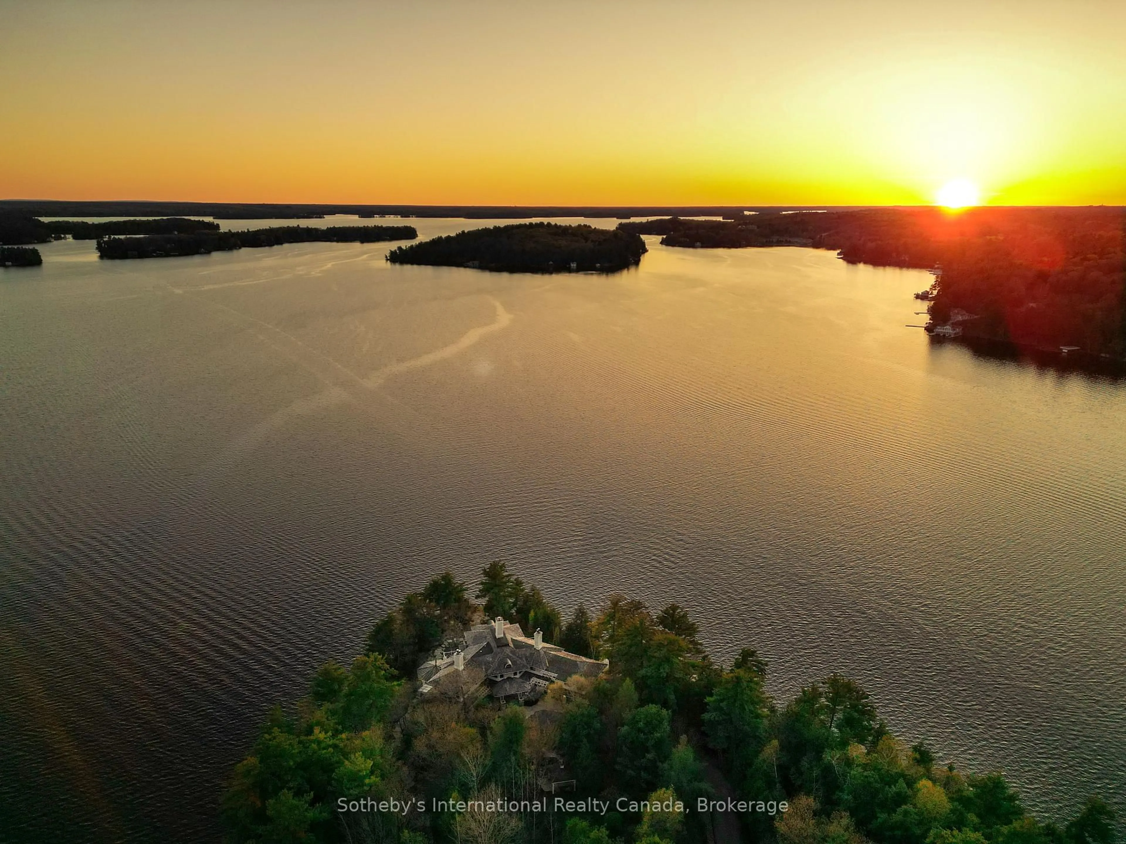 A pic from outside/outdoor area/front of a property/back of a property/a pic from drone, water/lake/river/ocean view for 1250 Waldmere Rd, Bracebridge Ontario P1L 1W8
