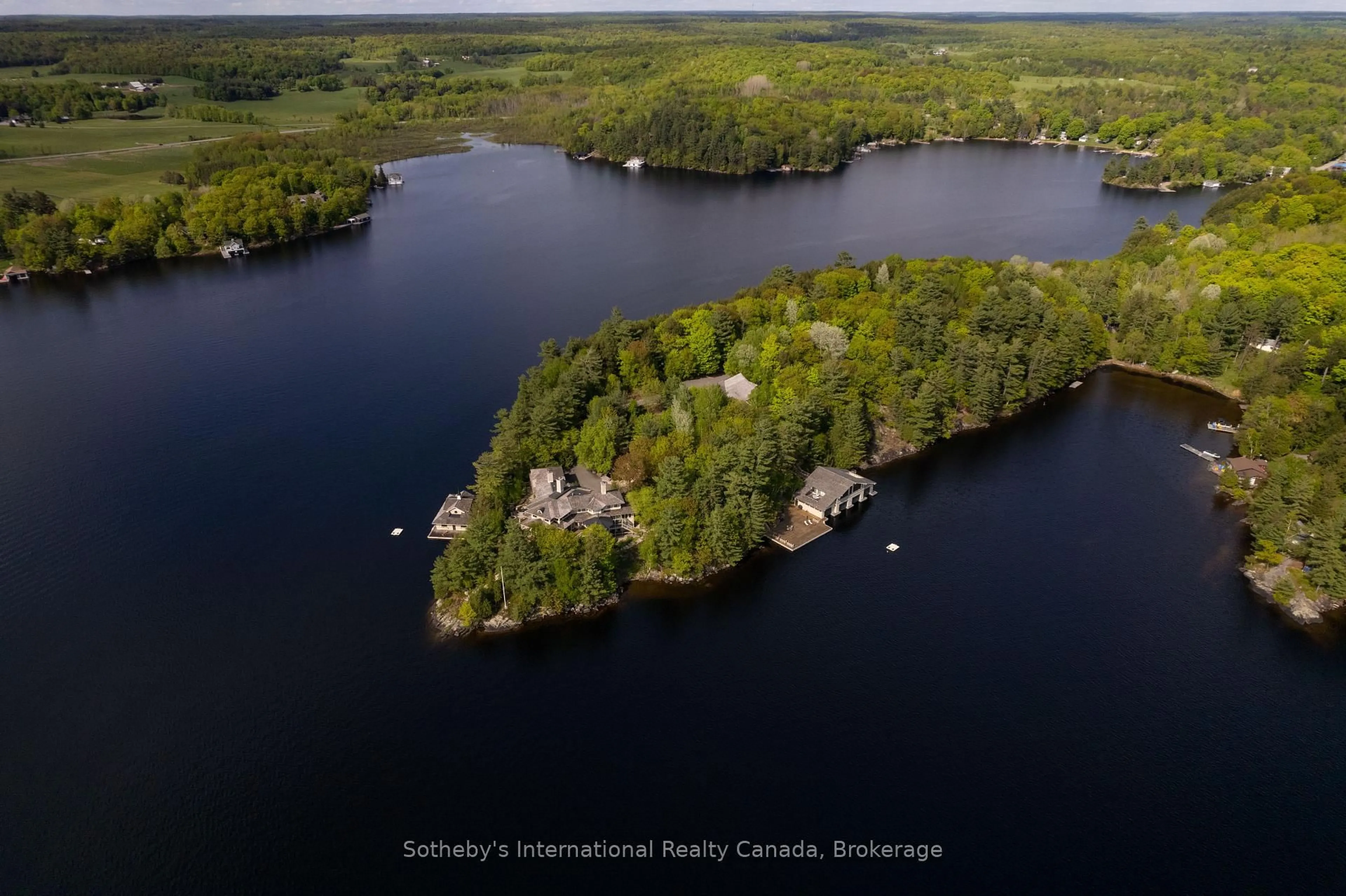 A pic from outside/outdoor area/front of a property/back of a property/a pic from drone, water/lake/river/ocean view for 1250 Waldmere Rd, Bracebridge Ontario P1L 1W8