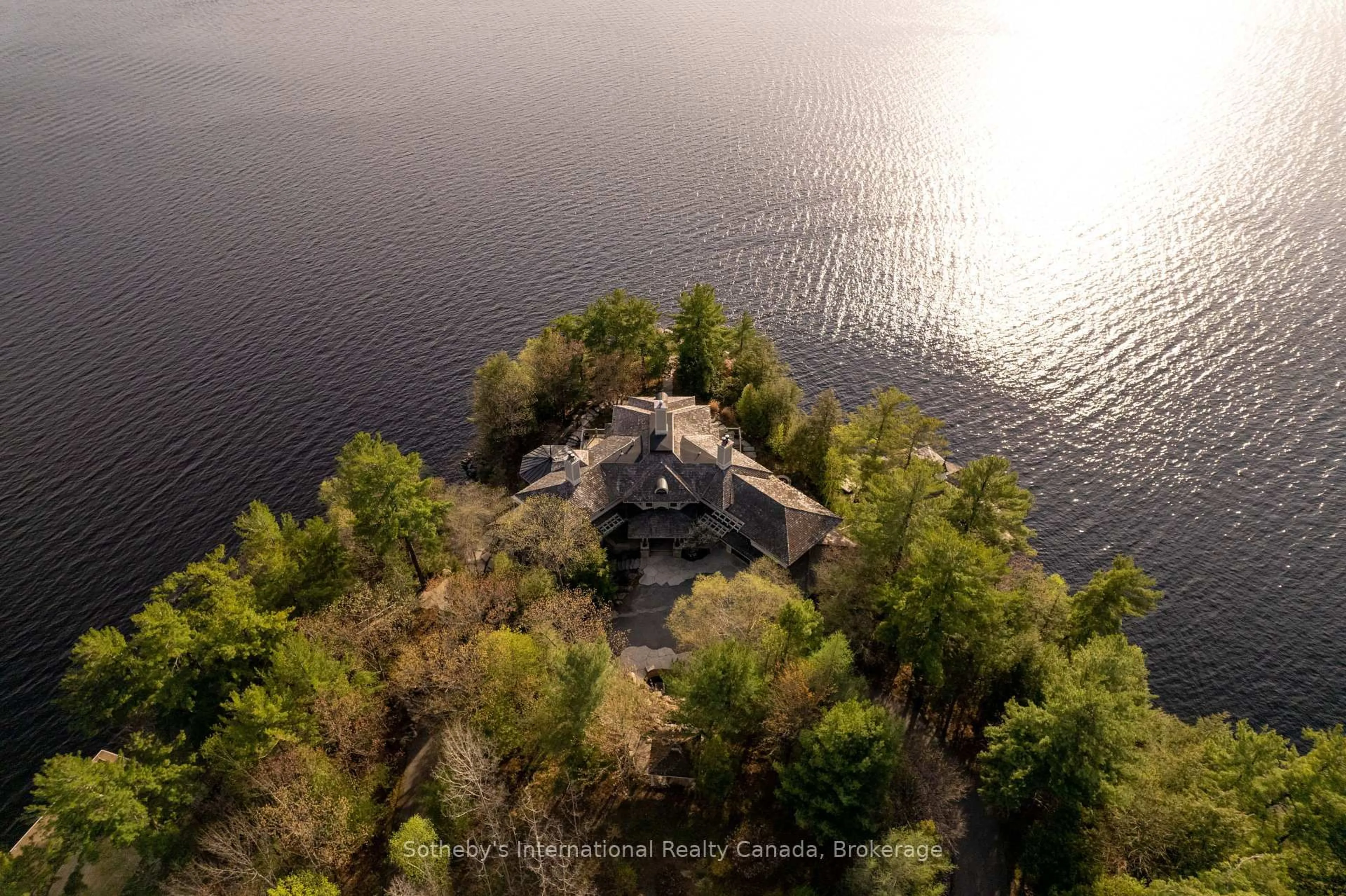 A pic from outside/outdoor area/front of a property/back of a property/a pic from drone, water/lake/river/ocean view for 1250 Waldmere Rd, Bracebridge Ontario P1L 1W8