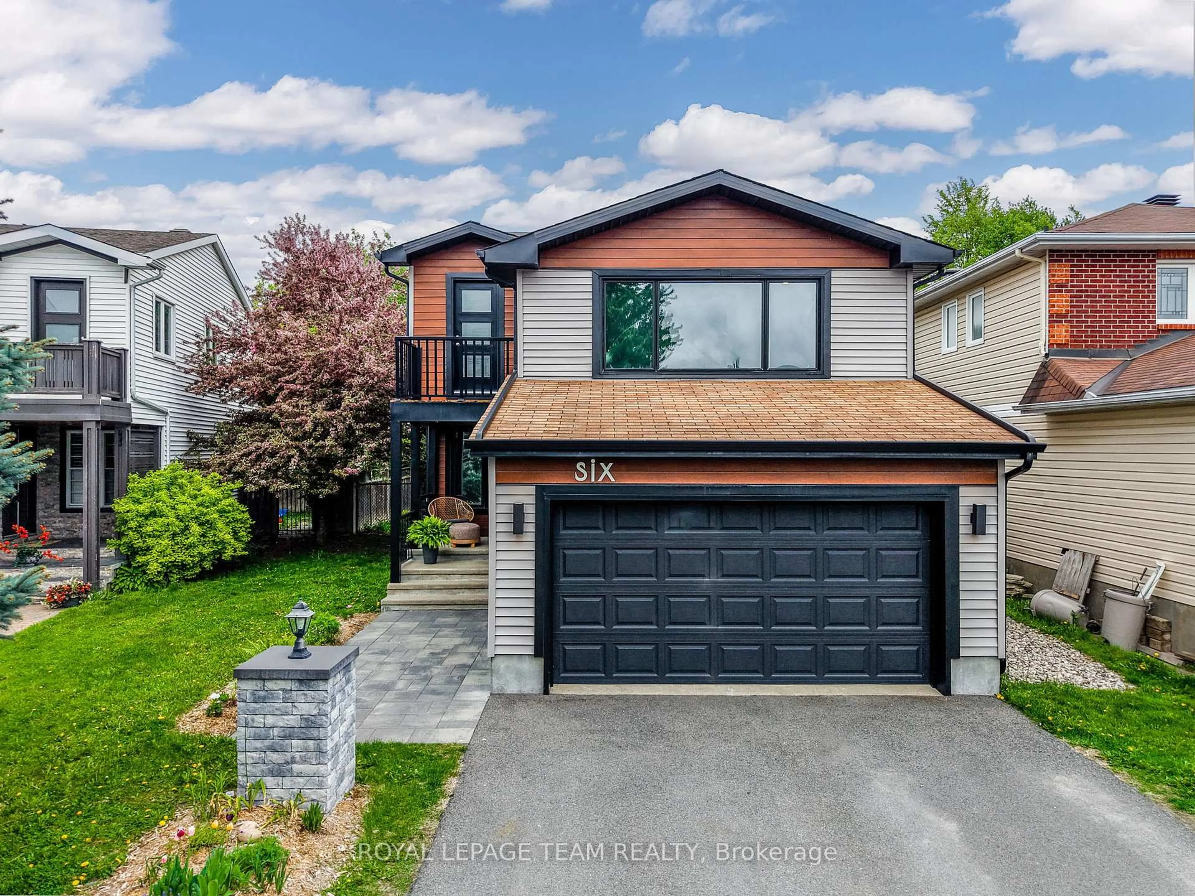 Home with vinyl exterior material, street for 6 Board Lane, Ottawa Ontario K2J 3X3
