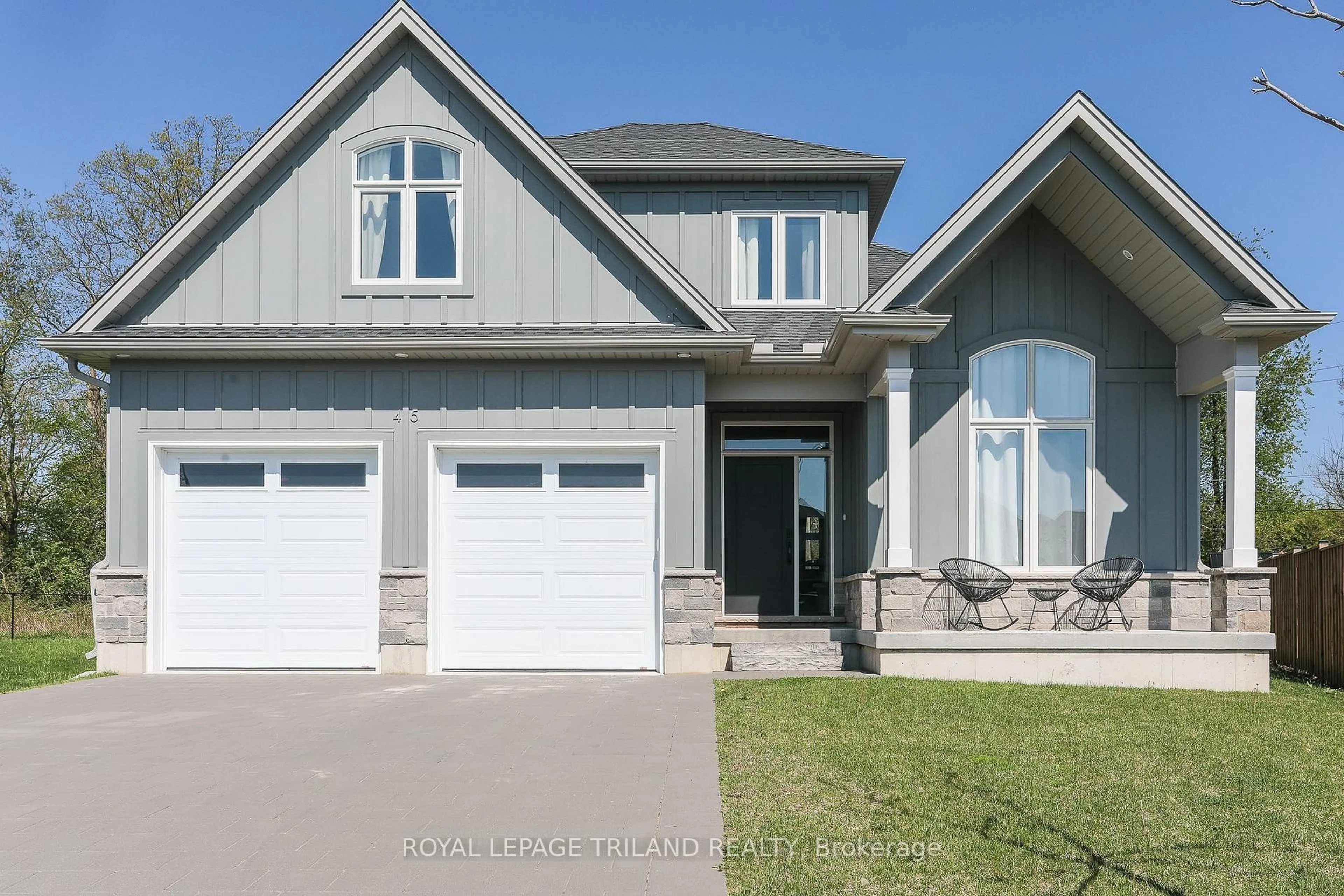 Home with vinyl exterior material, street for 45 Compass Tr, Central Elgin Ontario N5L 0B4