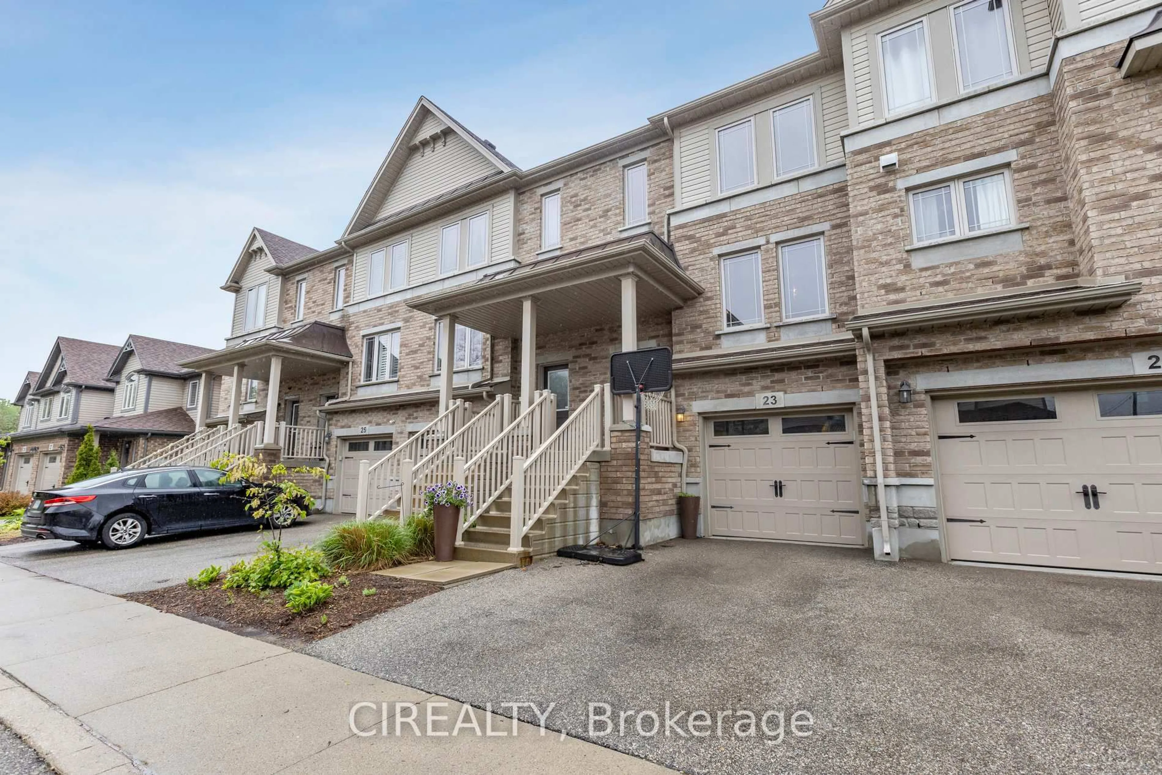 A pic from outside/outdoor area/front of a property/back of a property/a pic from drone, street for 66 Eastview Rd #23, Guelph Ontario N1E 0N1