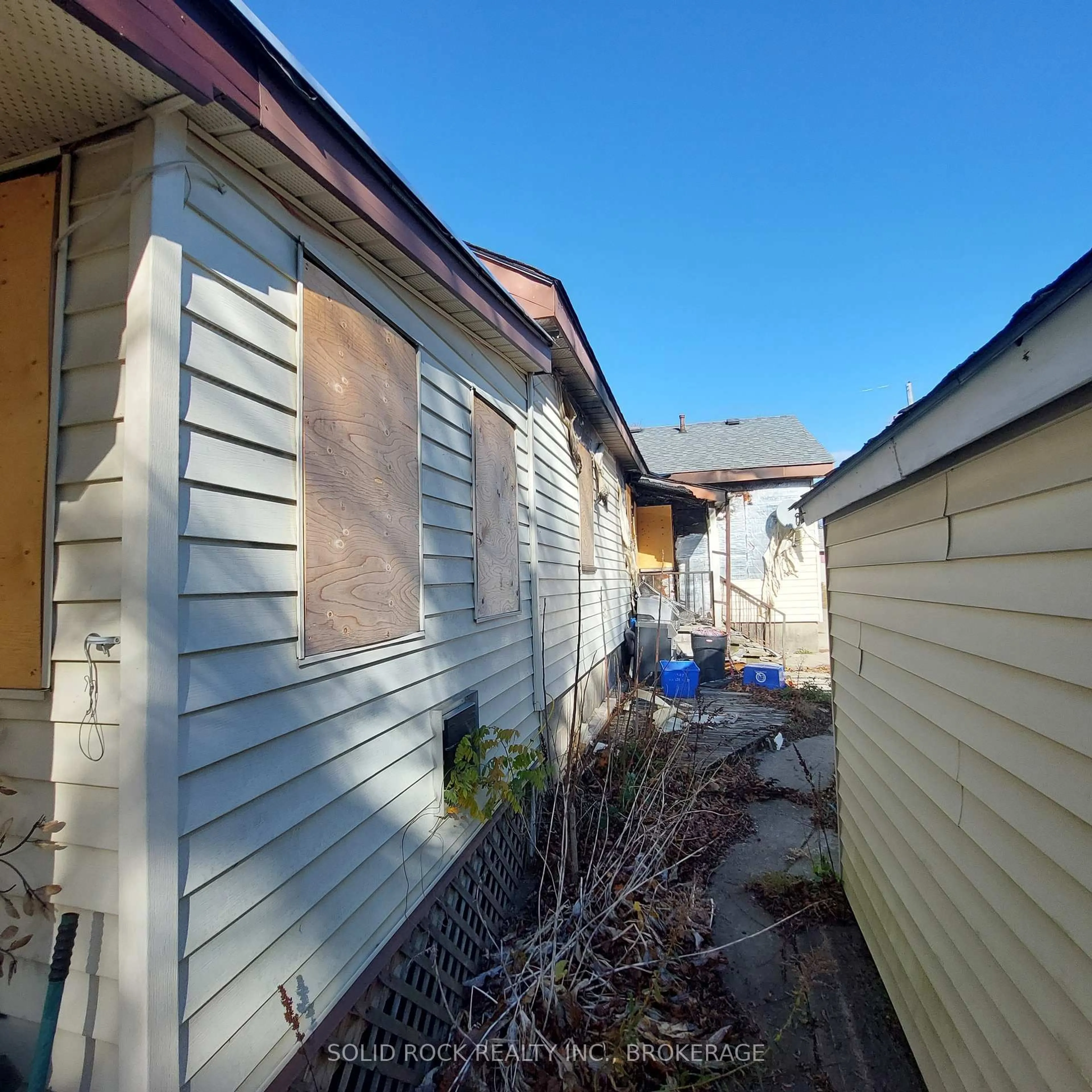 A pic from outside/outdoor area/front of a property/back of a property/a pic from drone, street for 8 Albert St, Prince Edward County Ontario K0K 2T0