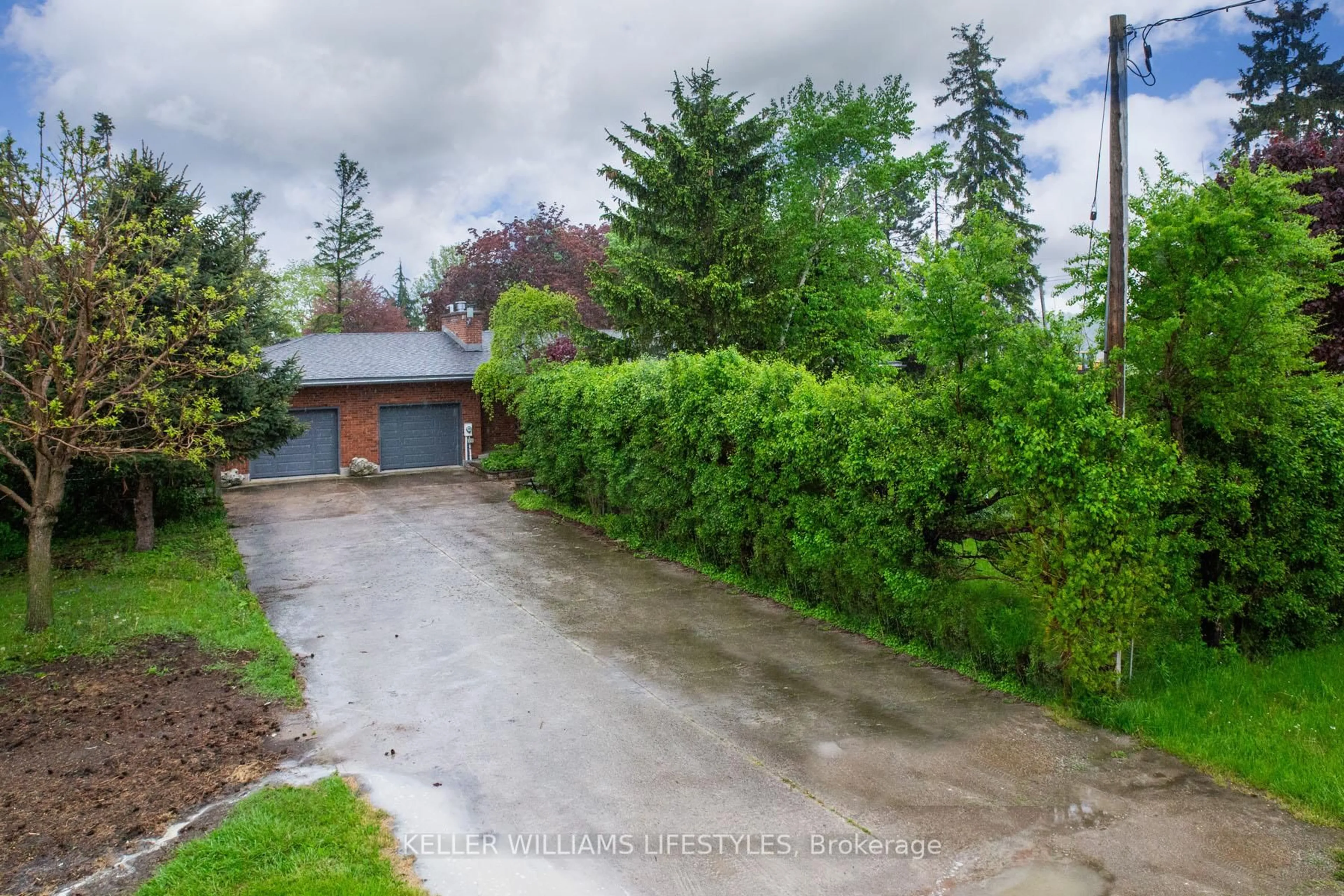A pic from outside/outdoor area/front of a property/back of a property/a pic from drone, street for 21854 Highbury Ave, Middlesex Centre Ontario N0M 1C0