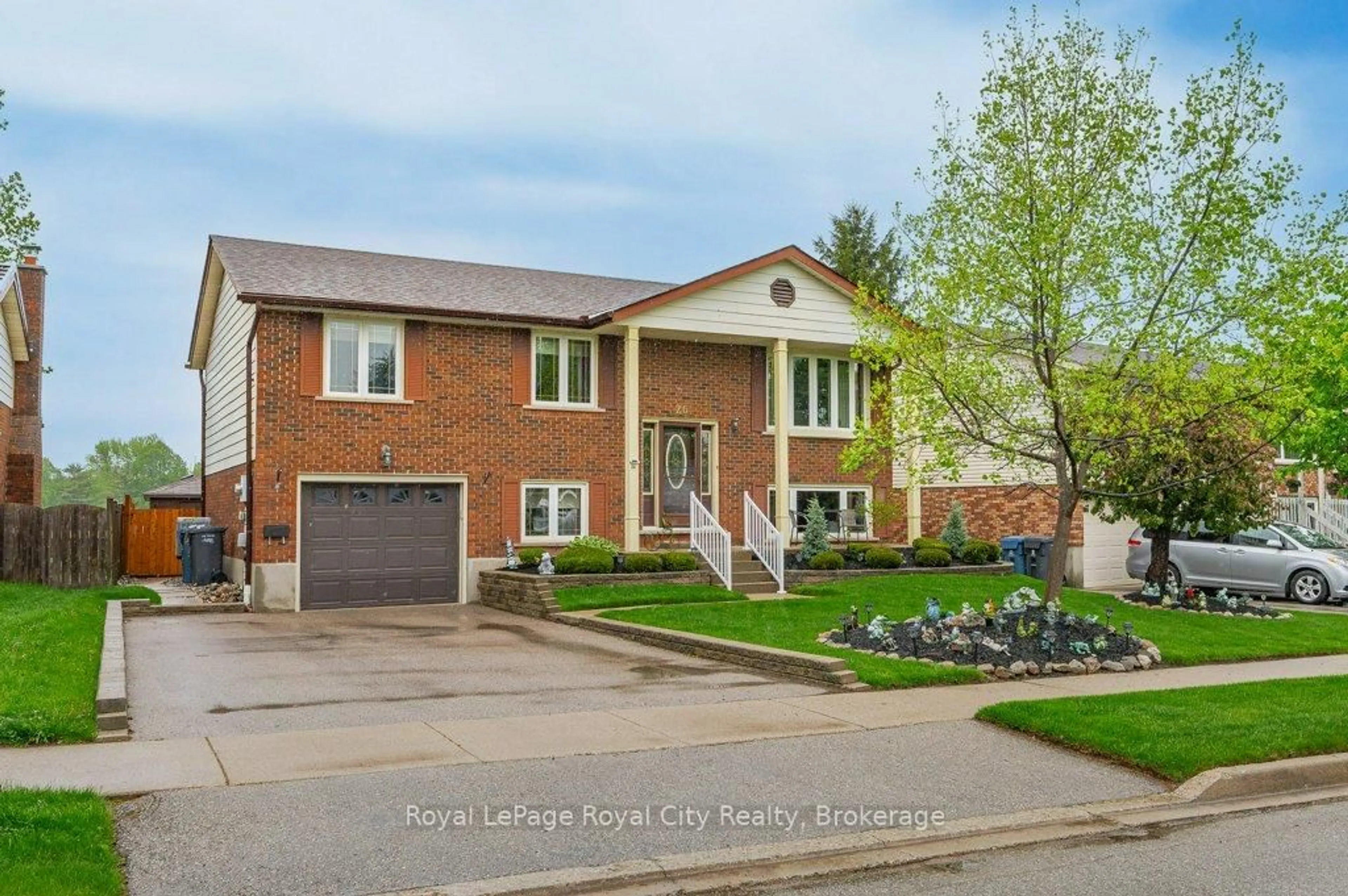 Home with brick exterior material, street for 26 Springdale Blvd, Guelph Ontario N1H 6X5