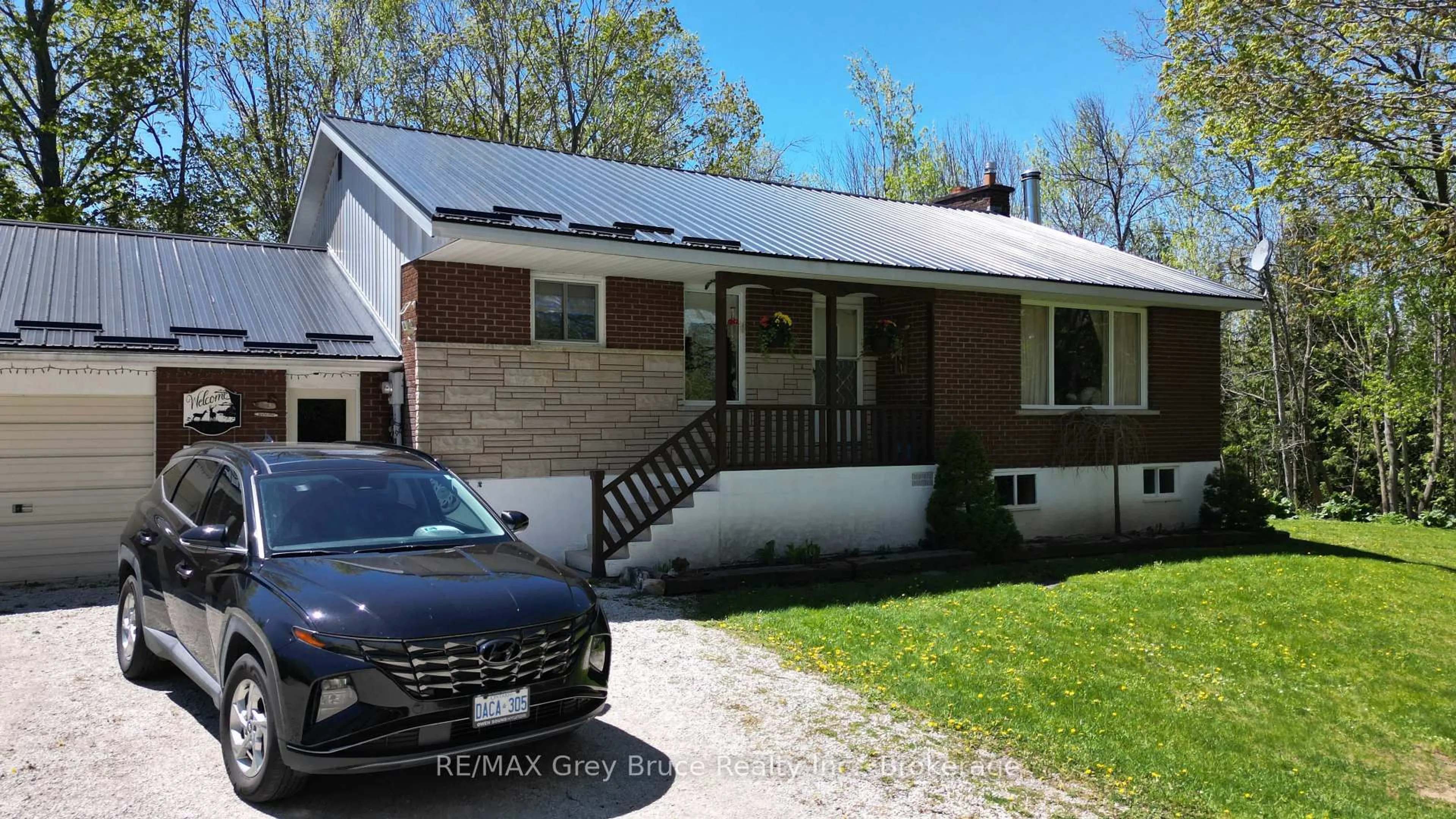 Home with vinyl exterior material, street for 3527 Highway 6, Northern Bruce Peninsula Ontario N0H 1W0