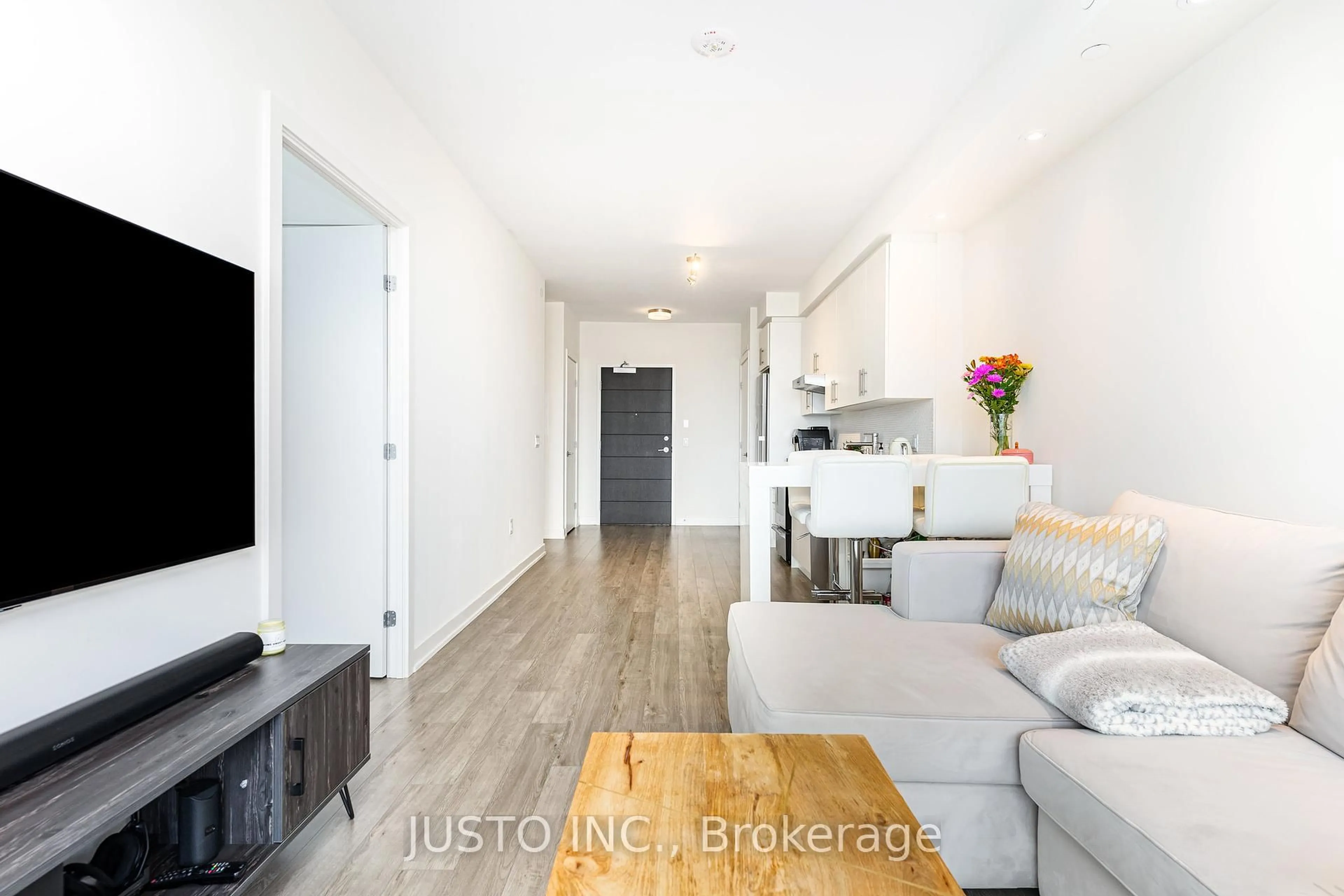 Living room with furniture, wood/laminate floor for 212 King William St #618, Hamilton Ontario L8R 0A7